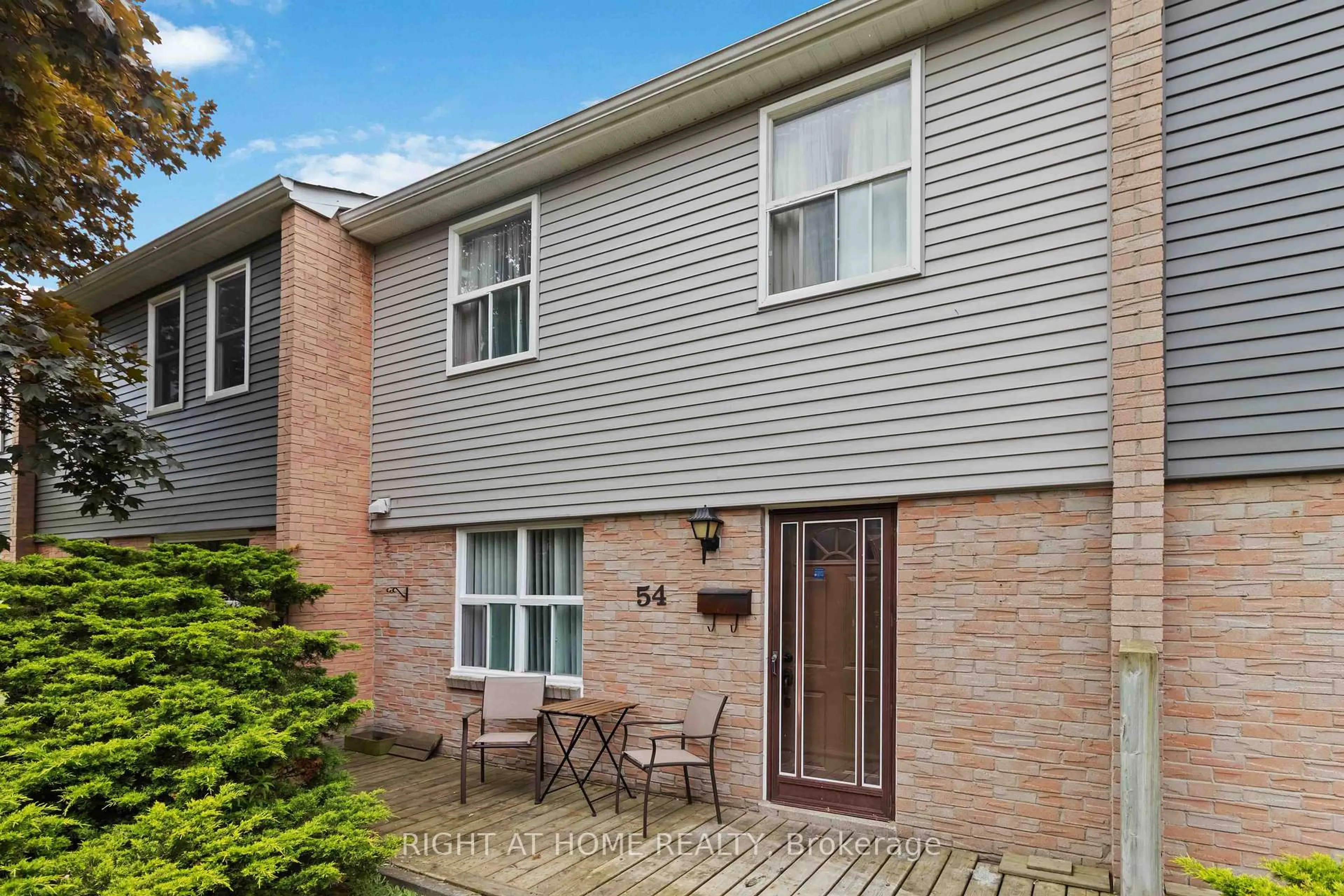 Home with brick exterior material, street for 1050 Shawnmarr Rd #54, Mississauga Ontario L5H 3V1