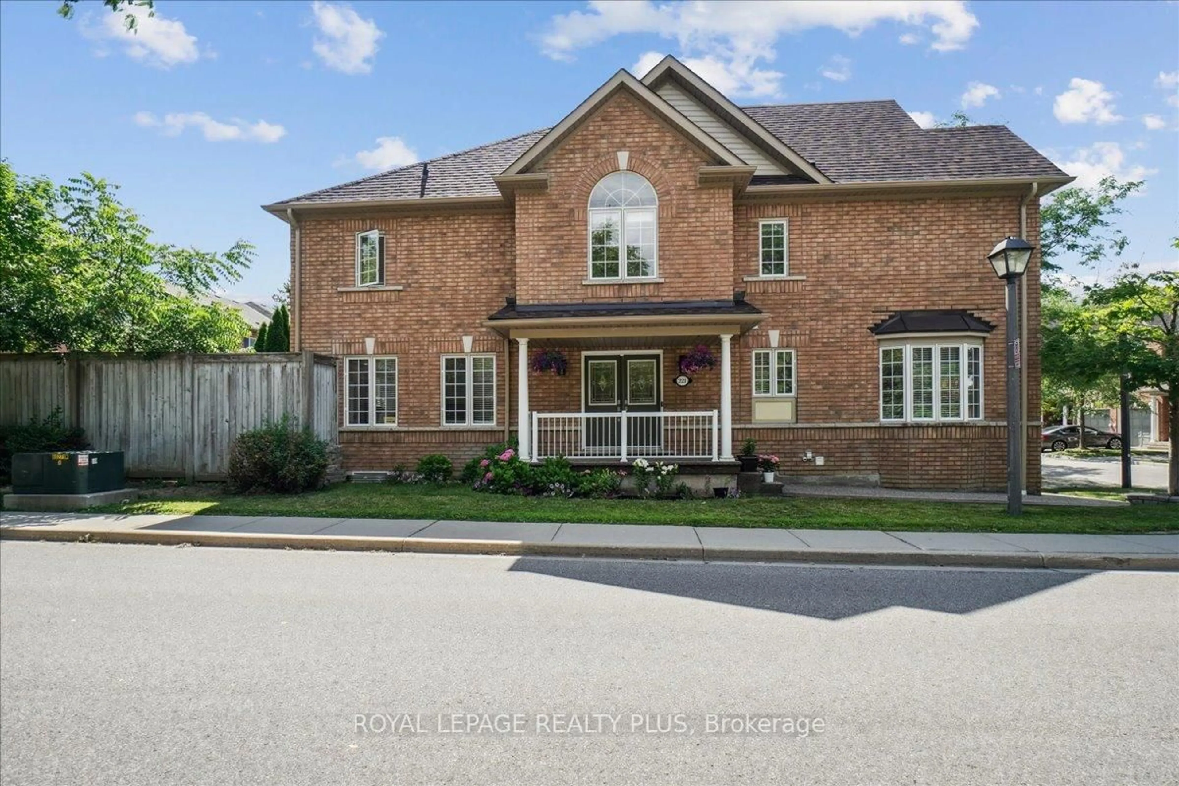 Home with brick exterior material, street for 7360 Zinnia Pl #221, Mississauga Ontario L5W 2A1