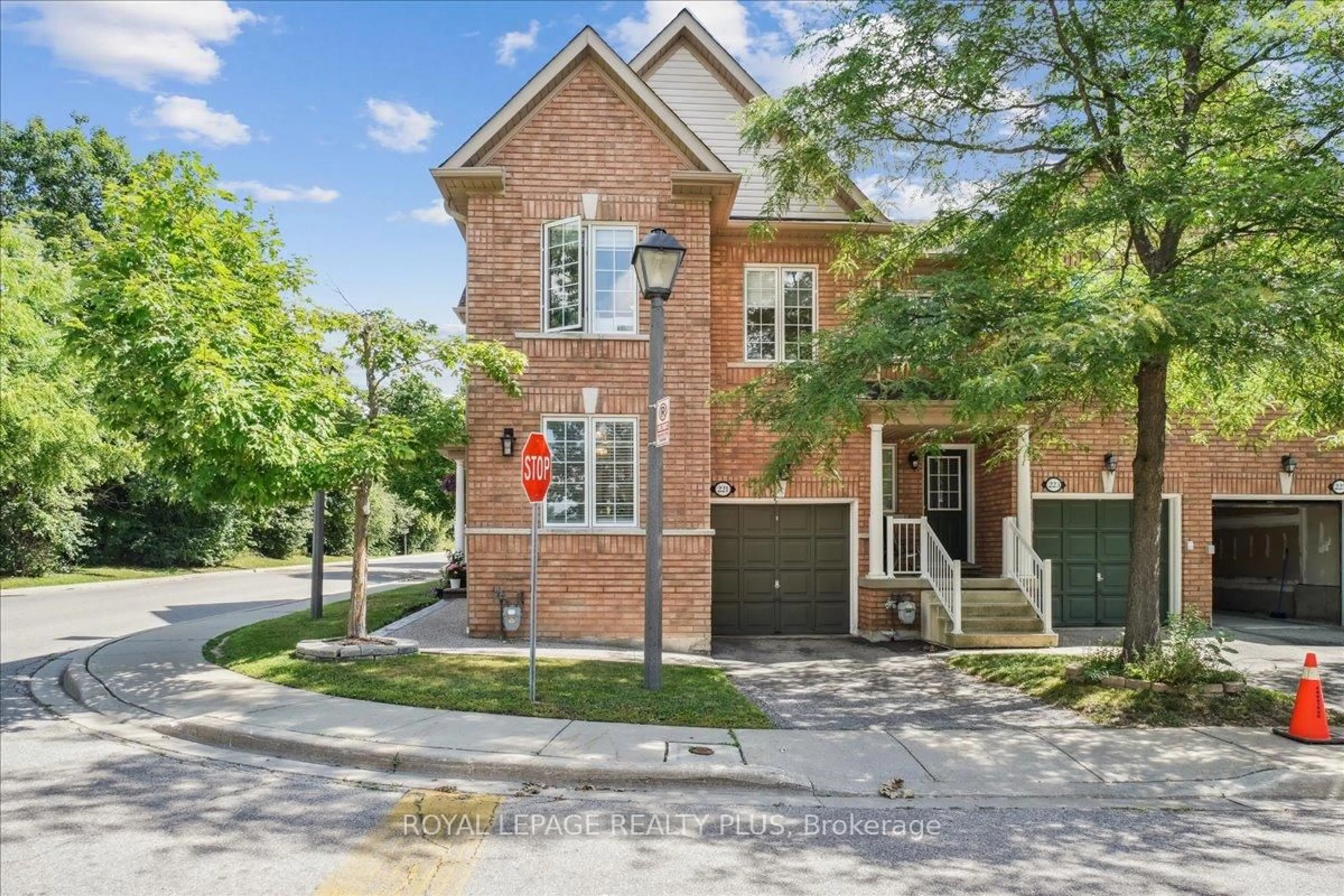 Home with brick exterior material, street for 7360 Zinnia Pl #221, Mississauga Ontario L5W 2A1