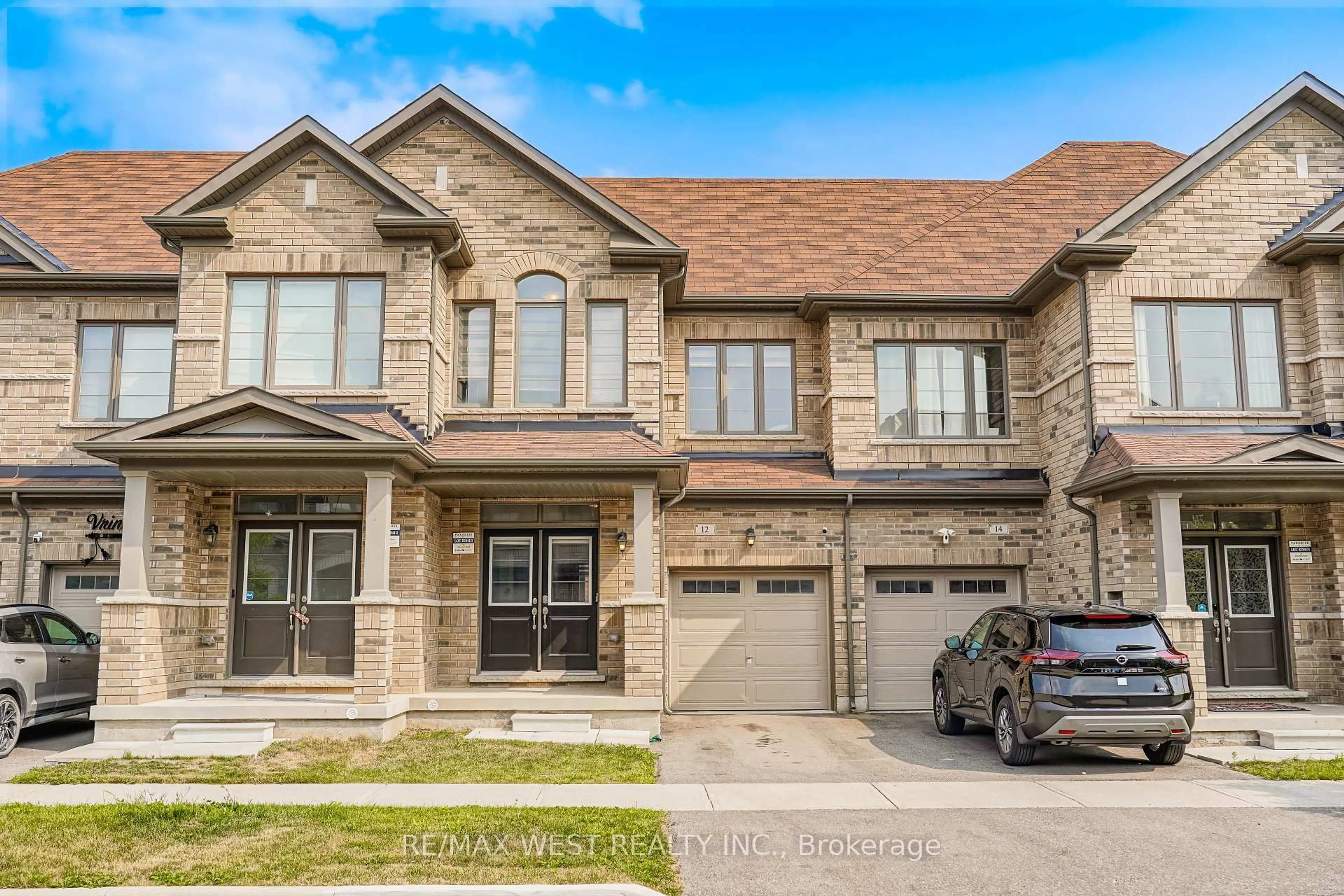 Home with brick exterior material, street for 12 Adventura Rd, Brampton Ontario L7A 5A7