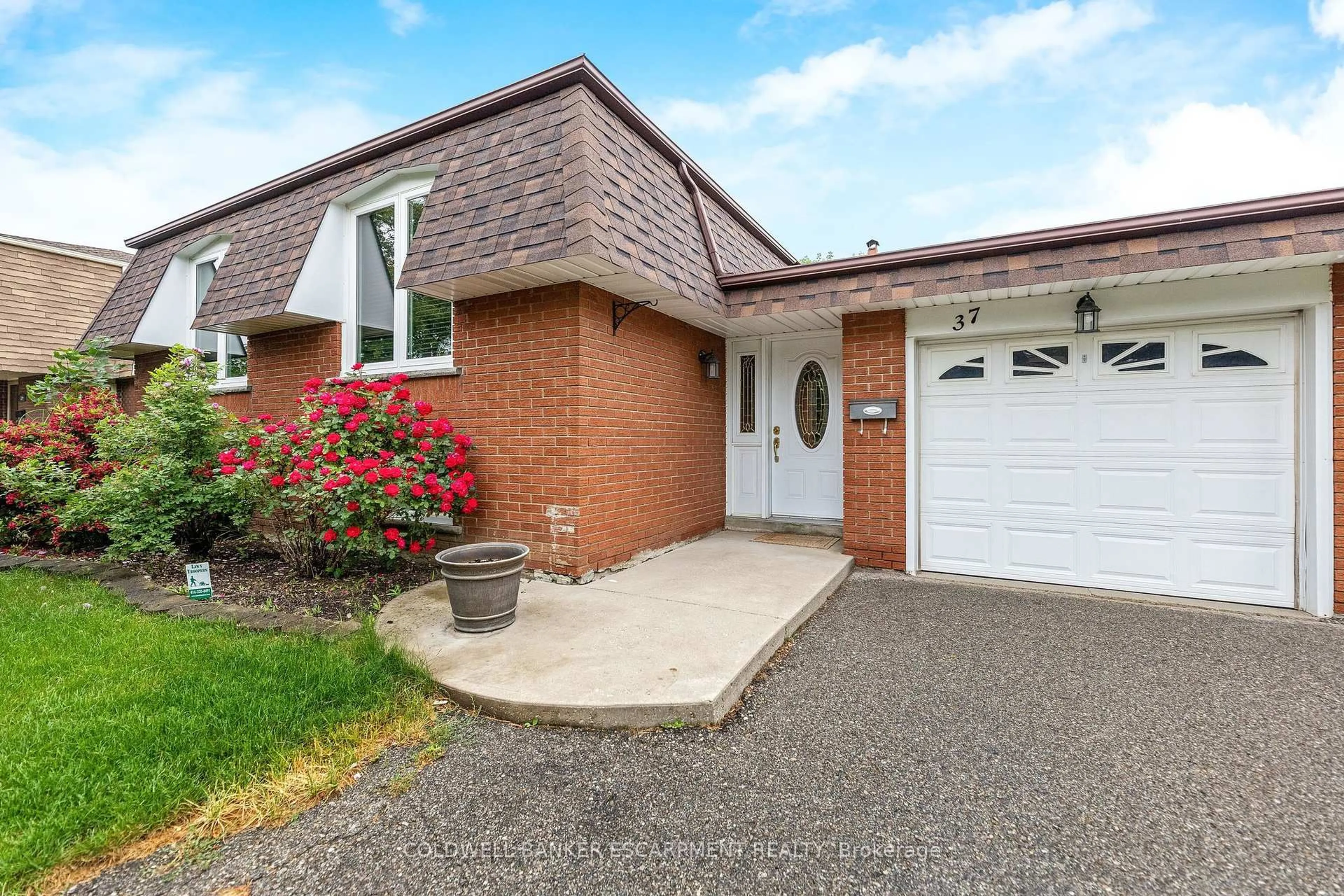 Home with brick exterior material, street for 37 Grassmere Cres, Brampton Ontario L6S 1C9