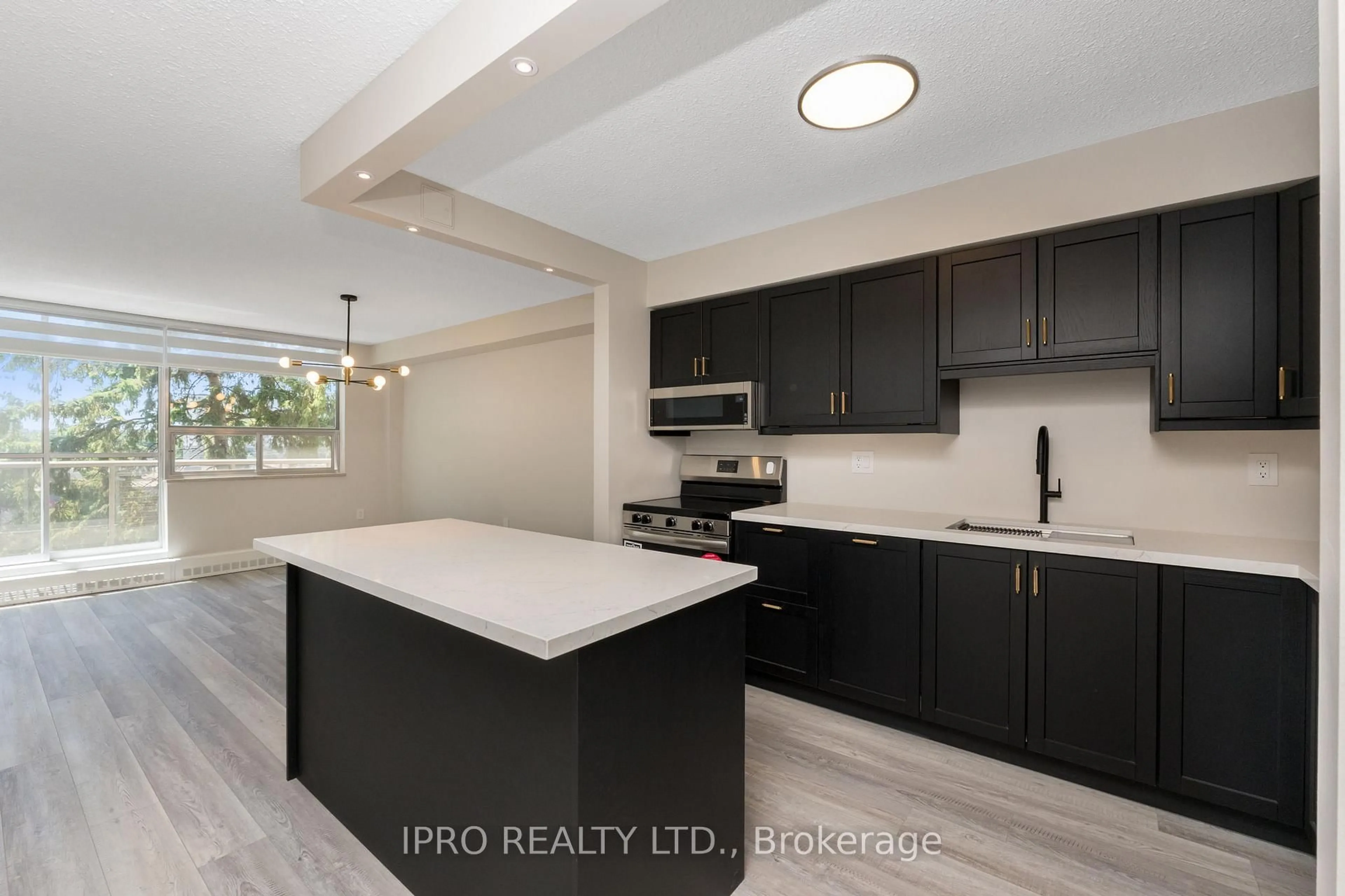 Open concept kitchen, unknown for 1050 Stainton Dr #319, Mississauga Ontario L5C 2T7