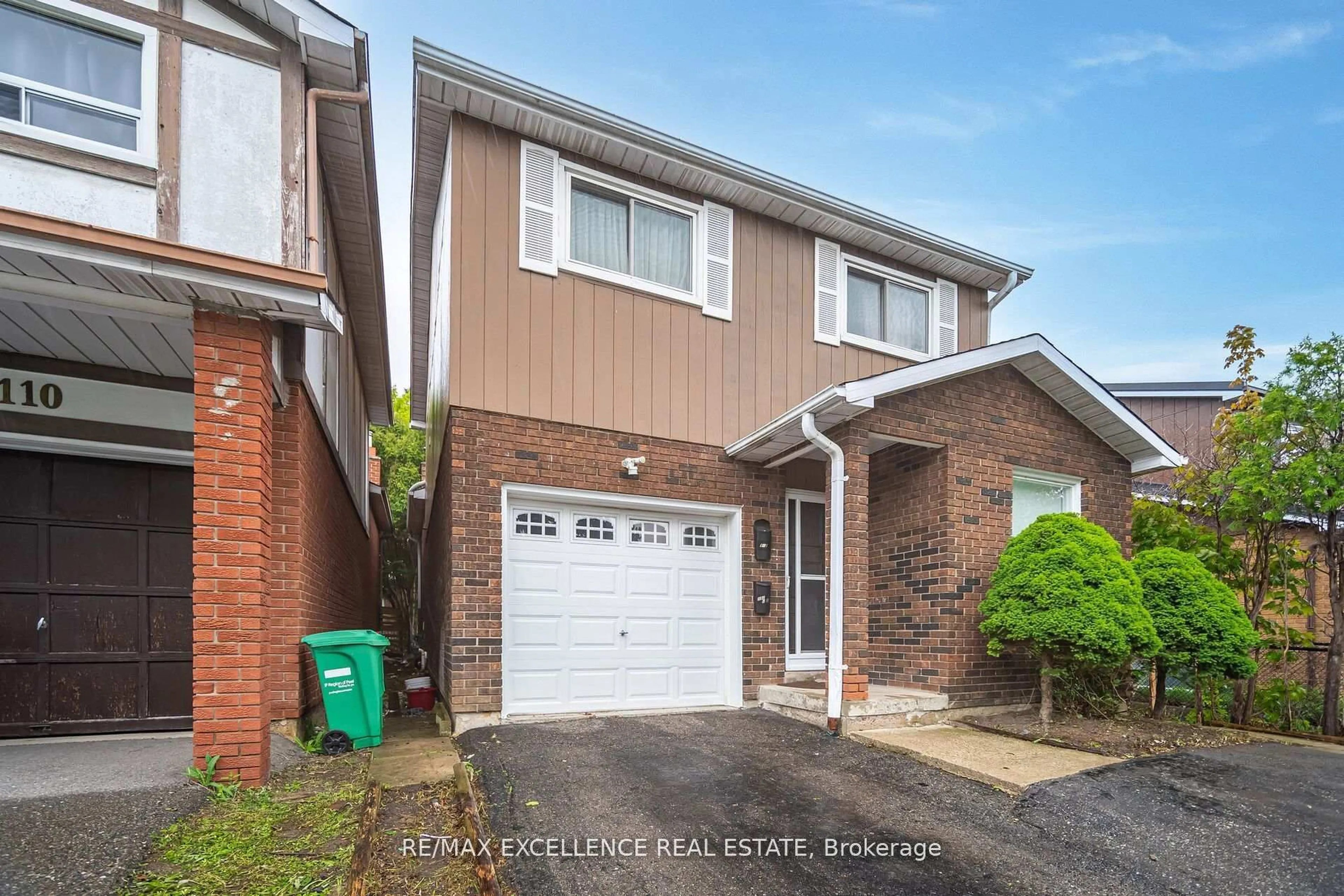 Home with brick exterior material, street for 112 Elderwood Pl, Brampton Ontario L6V 3N3