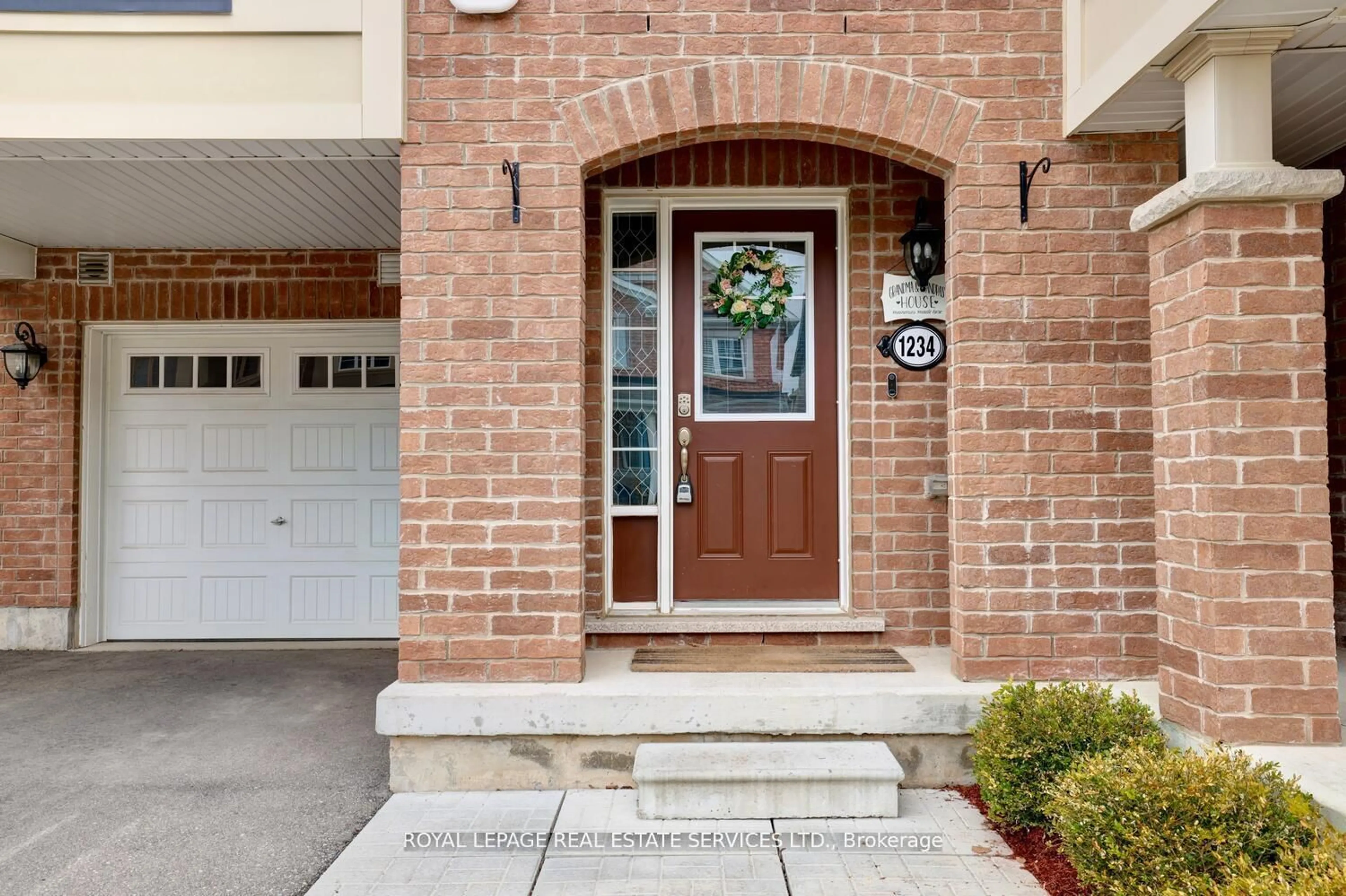 Home with brick exterior material, street for 1234 Rose Way, Milton Ontario L9E 1L9