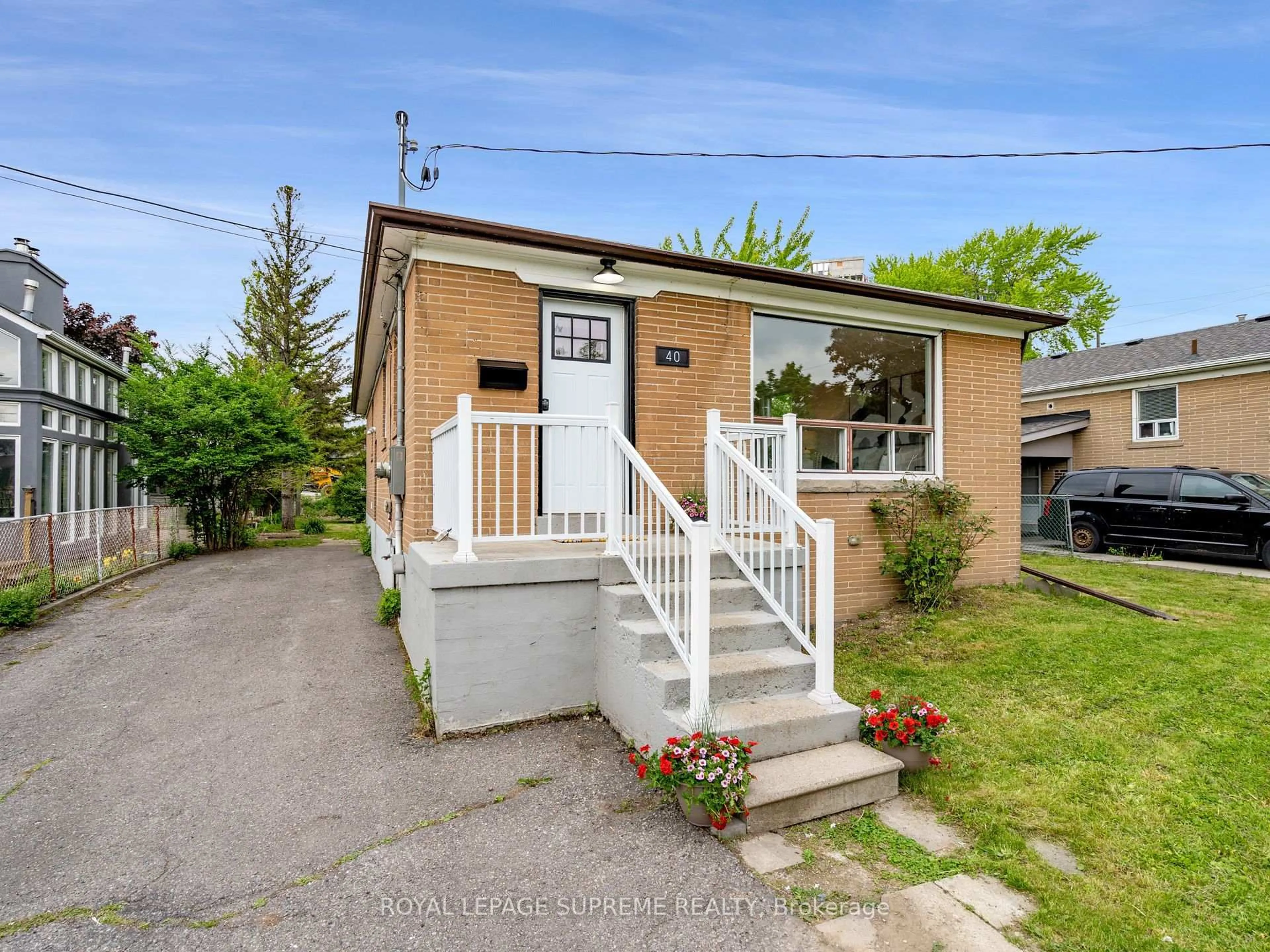 Home with brick exterior material, street for 40 Cartwright Ave, Toronto Ontario M6A 1T9