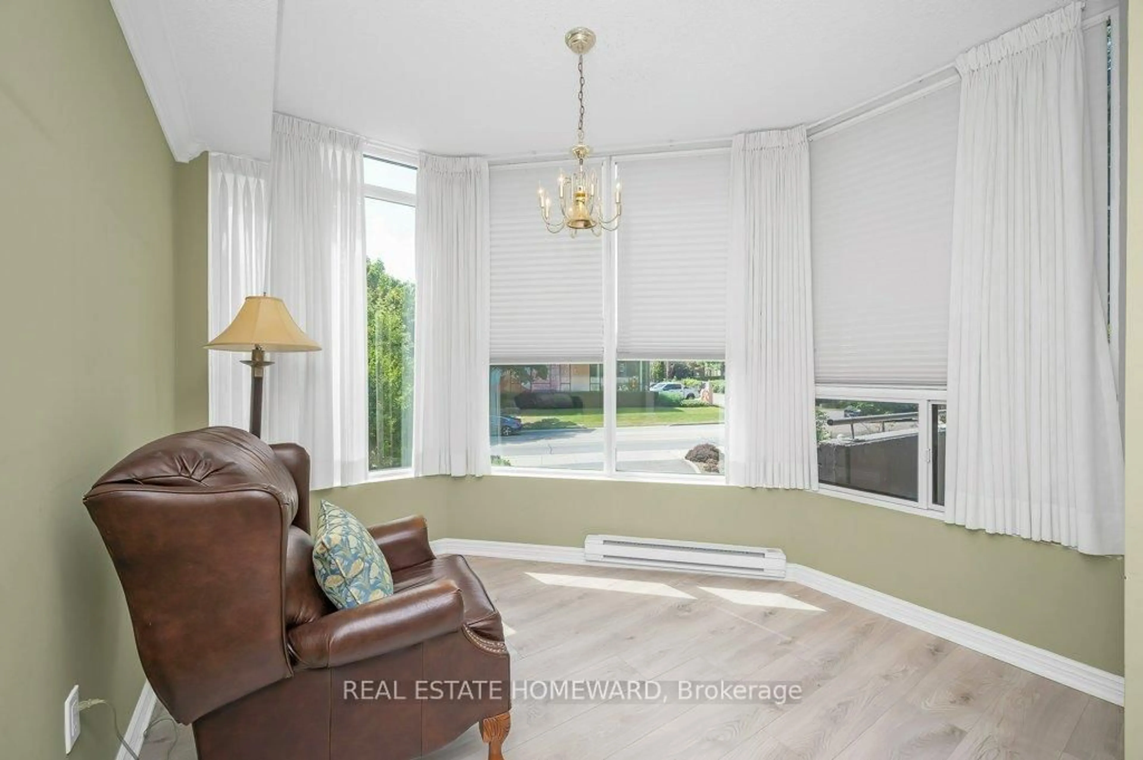 Living room with furniture, unknown for 2121 Lakeshore Rd #203, Burlington Ontario L7R 1C9