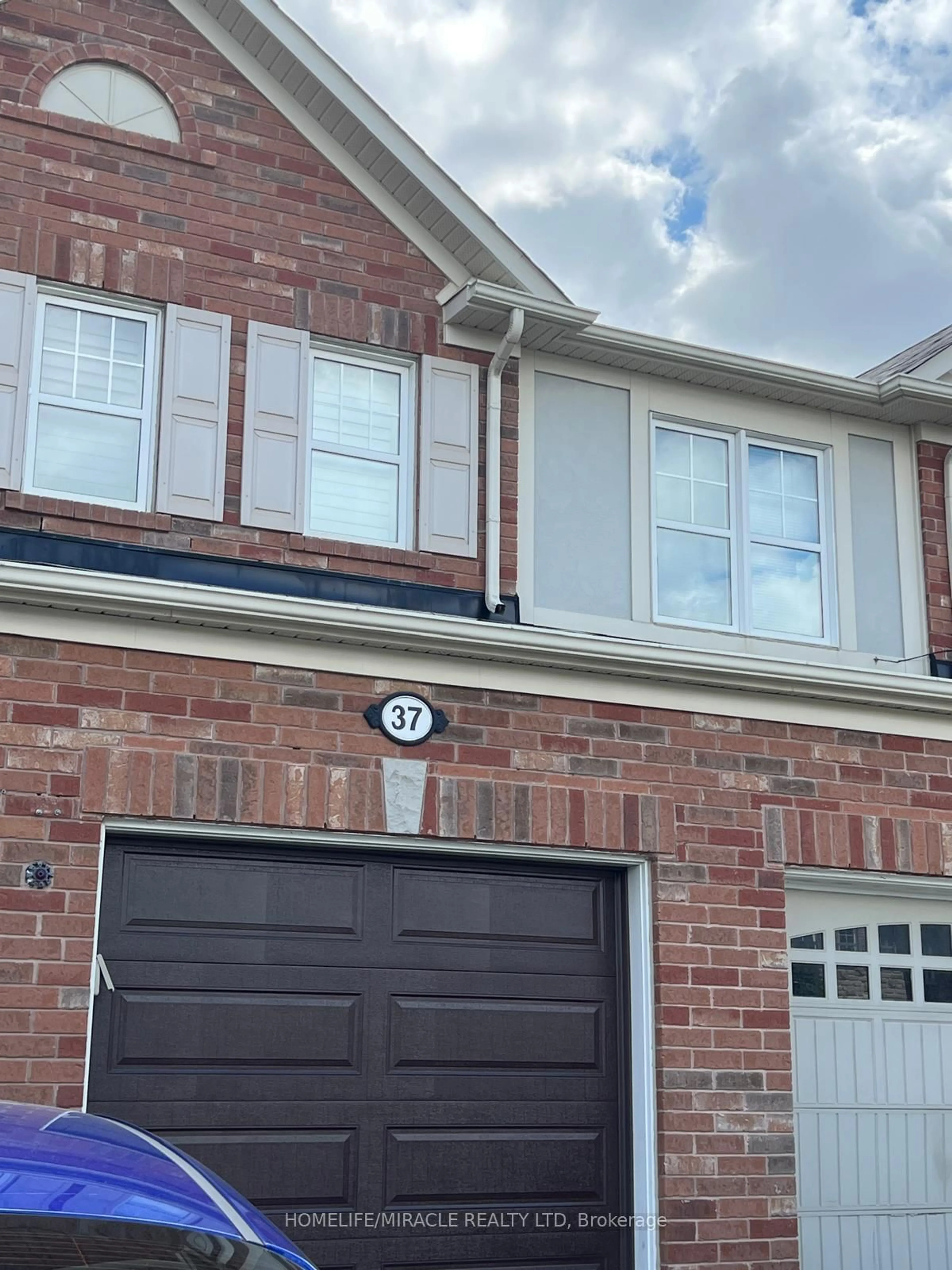 Home with brick exterior material, street for 37 Caliper Rd, Brampton Ontario L6P 3R2