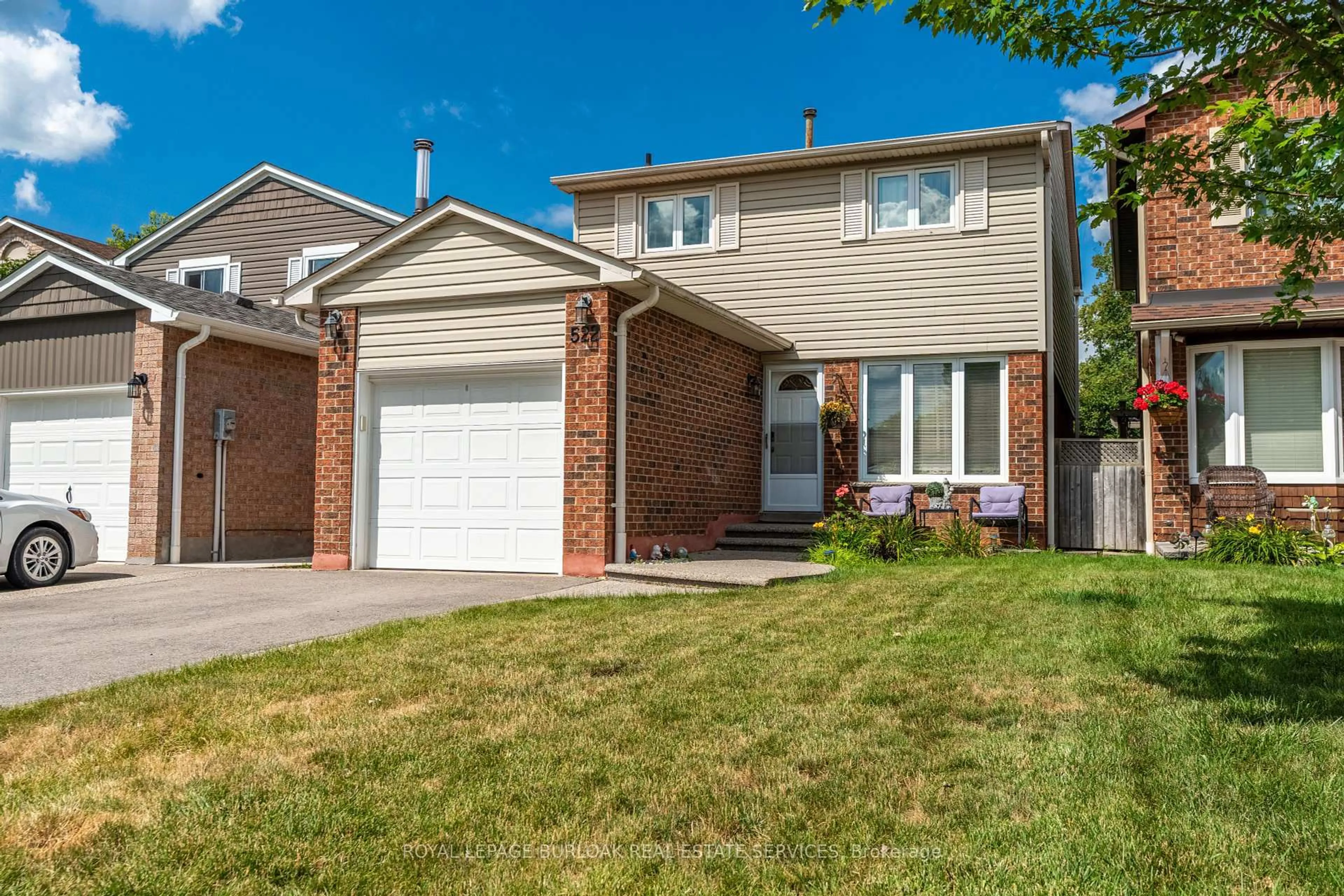 Home with brick exterior material, street for 522 Roseheath Dr, Milton Ontario L9T 4V6