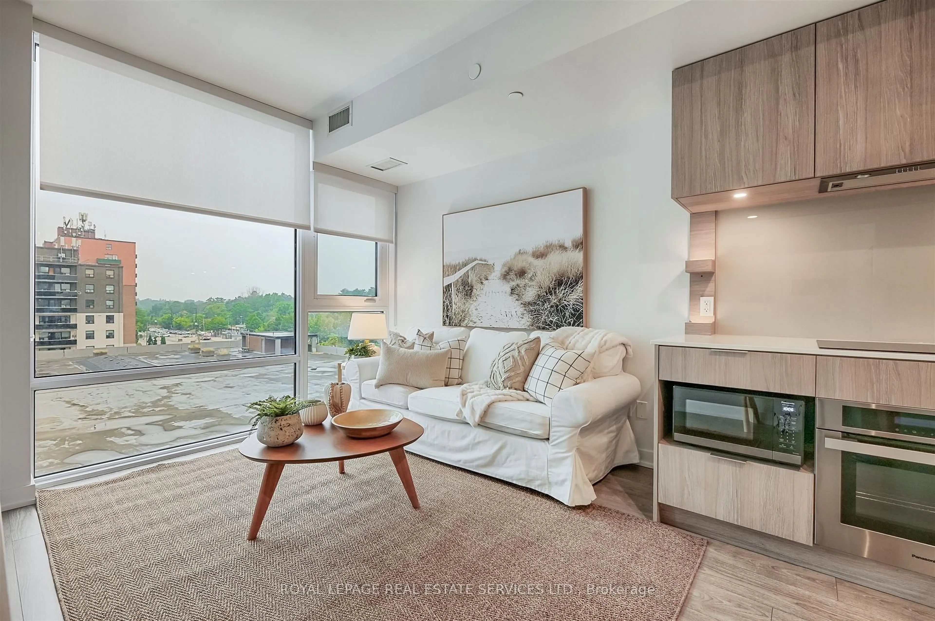 Living room with furniture, unknown for 28 Ann St #417, Mississauga Ontario L5G 3G1