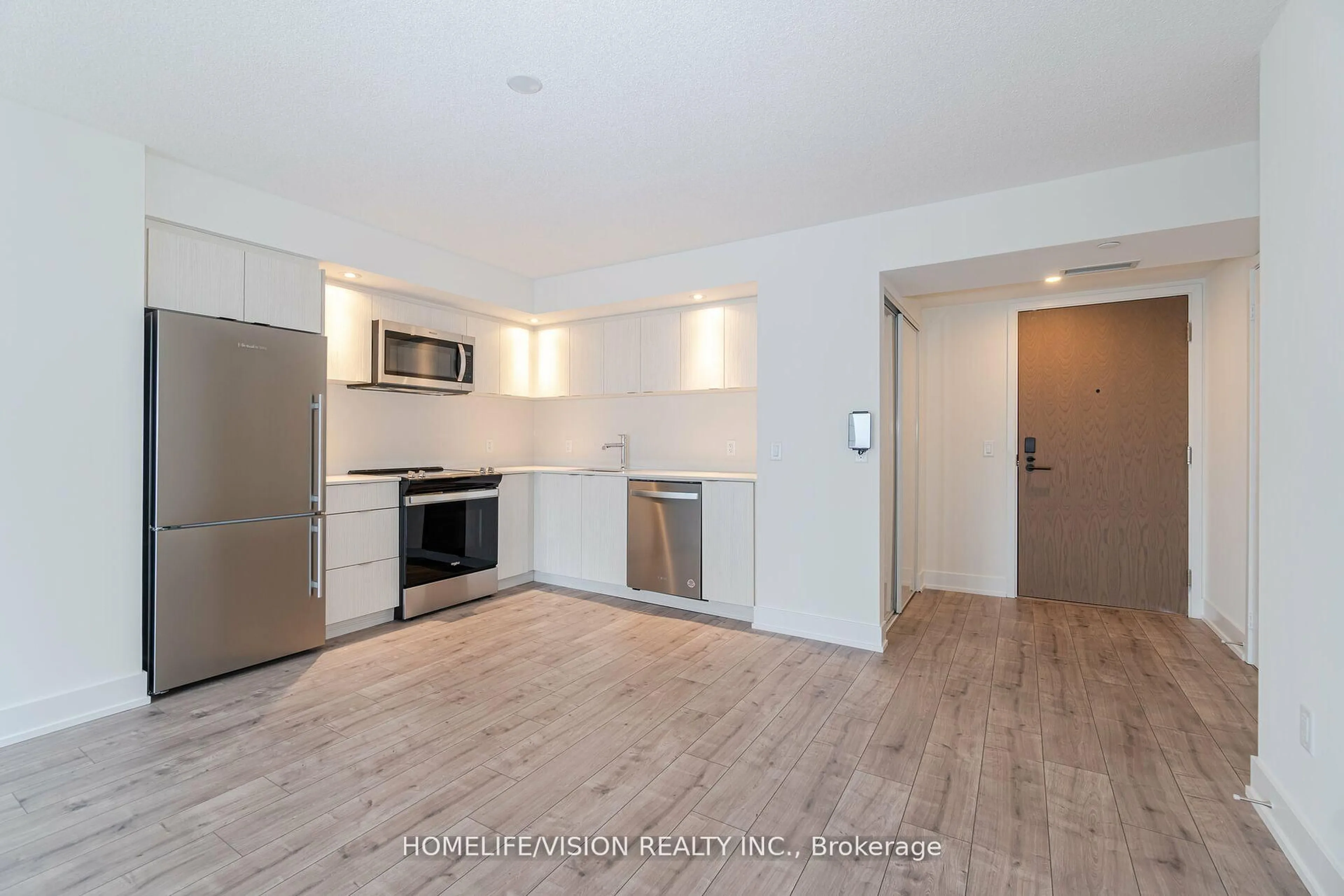Open concept kitchen, unknown for 10 Eva Rd #403, Toronto Ontario M9C 0B3