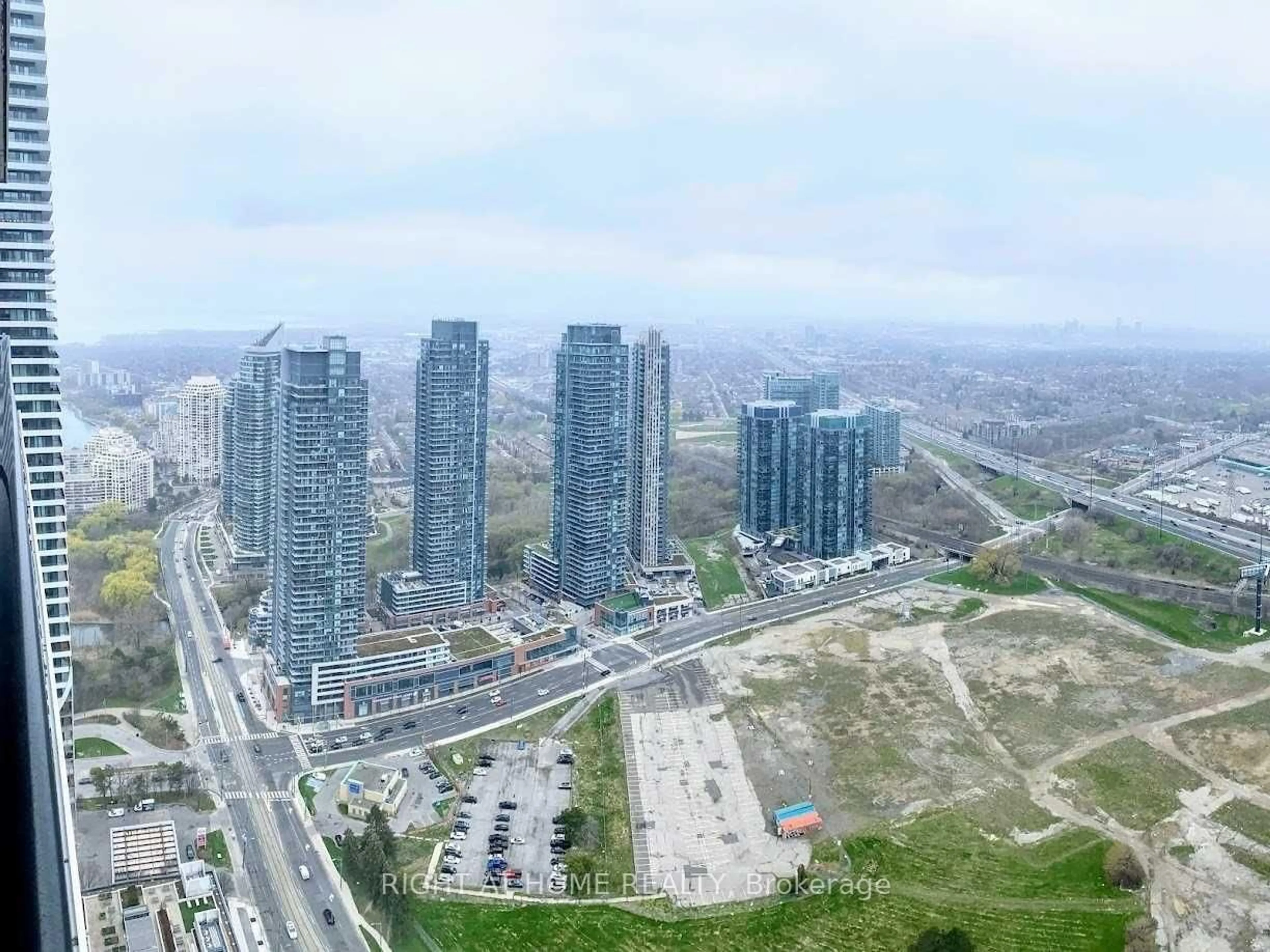 A pic from outside/outdoor area/front of a property/back of a property/a pic from drone, city buildings view from balcony for 70 Annie Craig Dr #5208, Toronto Ontario M8V 0G2