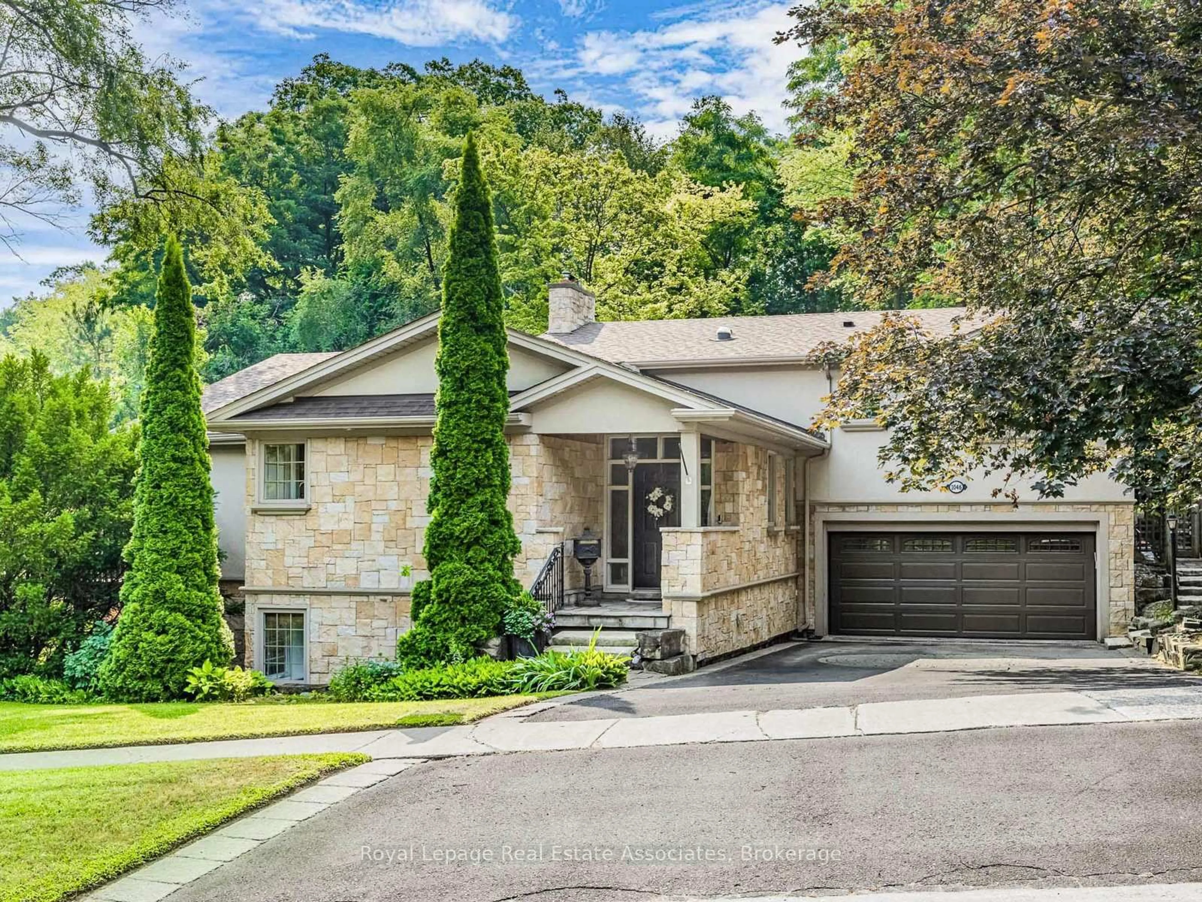 Home with brick exterior material, street for 1046 Springhill Dr, Mississauga Ontario L5H 1M9