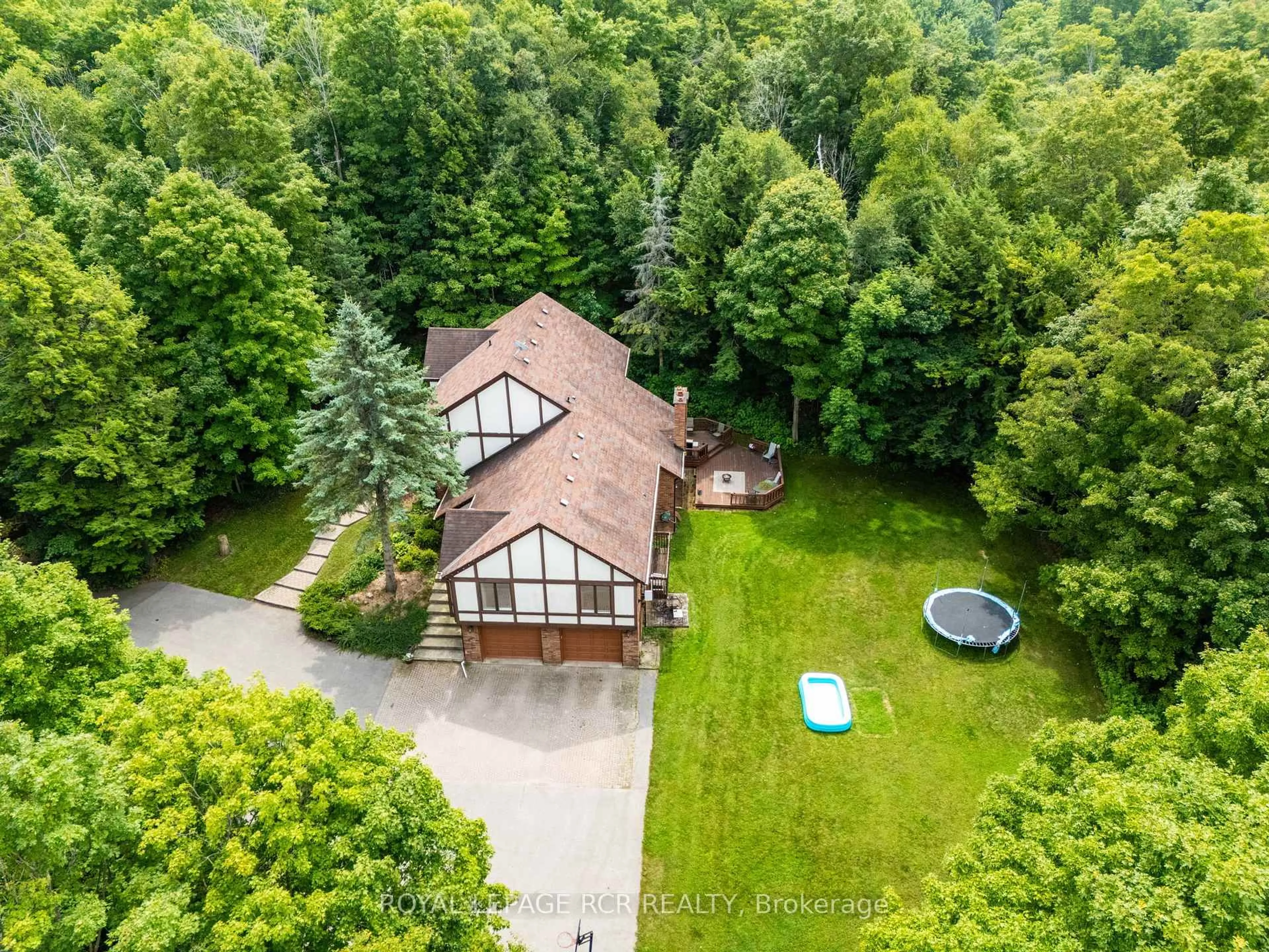 A pic from outside/outdoor area/front of a property/back of a property/a pic from drone, forest/trees view for 832 Boston Mills Rd, Caledon Ontario L7C 0L7
