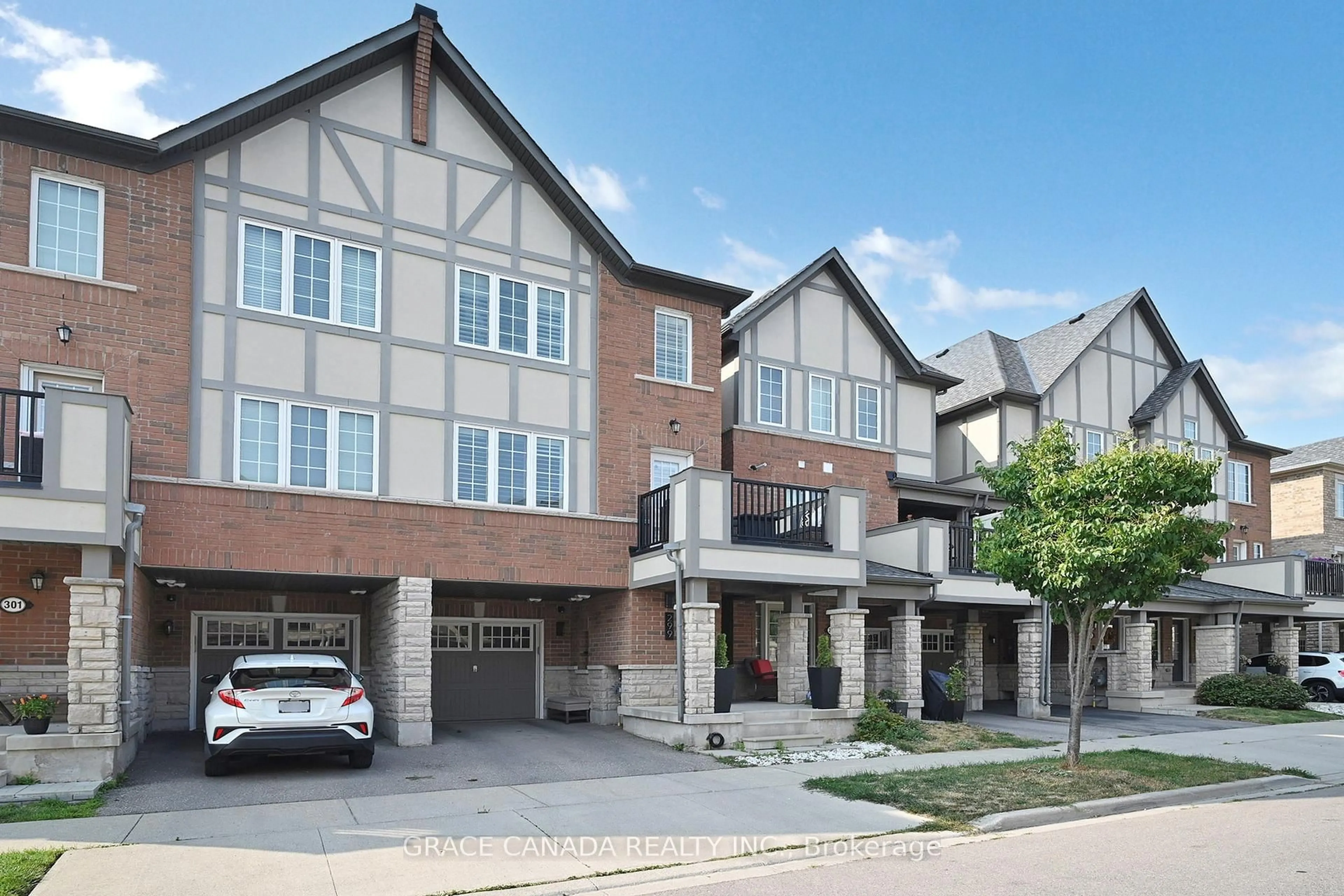 Home with brick exterior material, street for 299 Jemima Dr, Oakville Ontario L6M 0V6