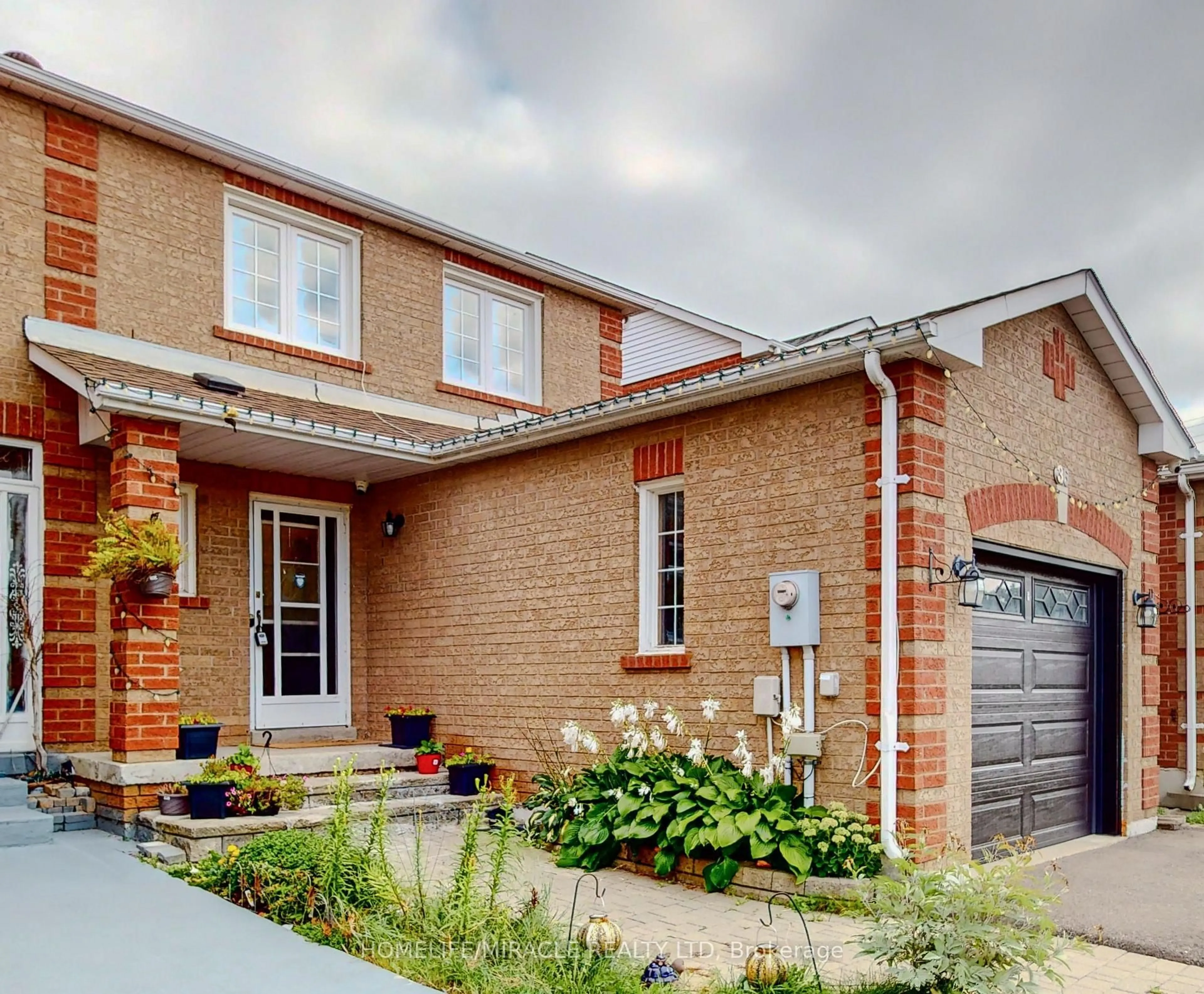 Home with brick exterior material, street for 36 Mannel Cres, Brampton Ontario L6Y 5E2