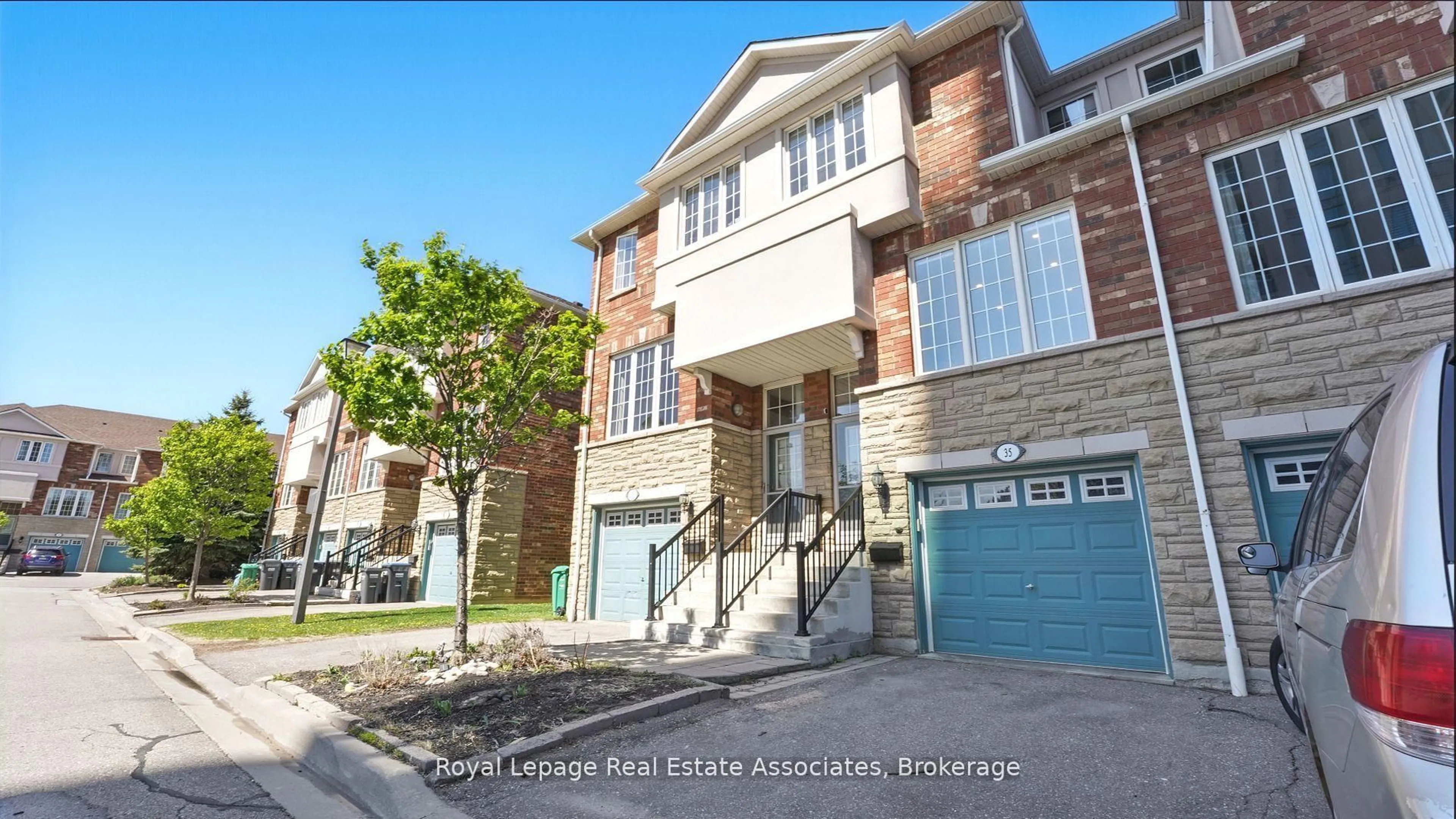 Home with brick exterior material, street for 1355 Rathburn Rd #35, Mississauga Ontario L4W 5R5