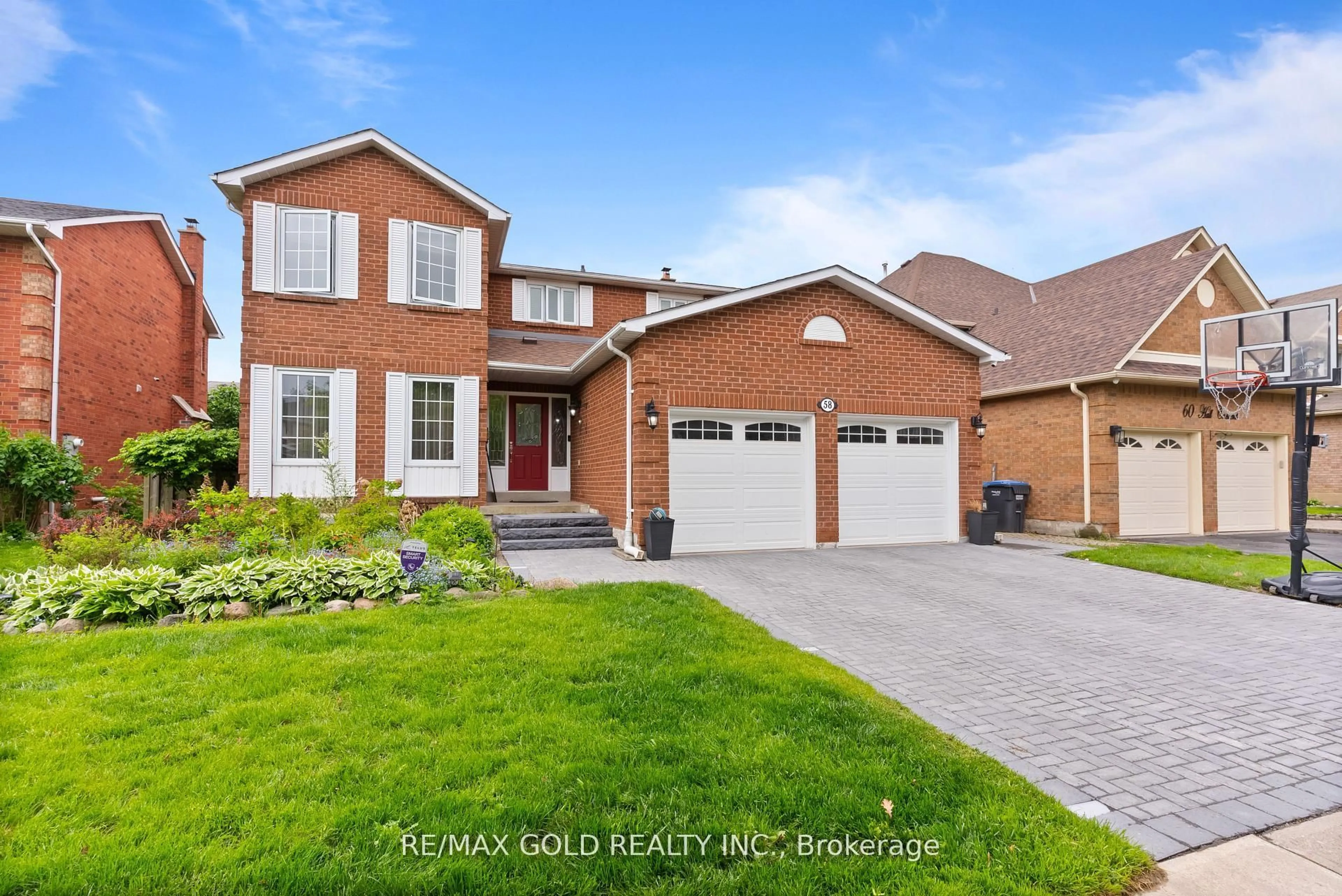 Home with brick exterior material, street for 58 Hall Cres, Brampton Ontario L6X 3J5
