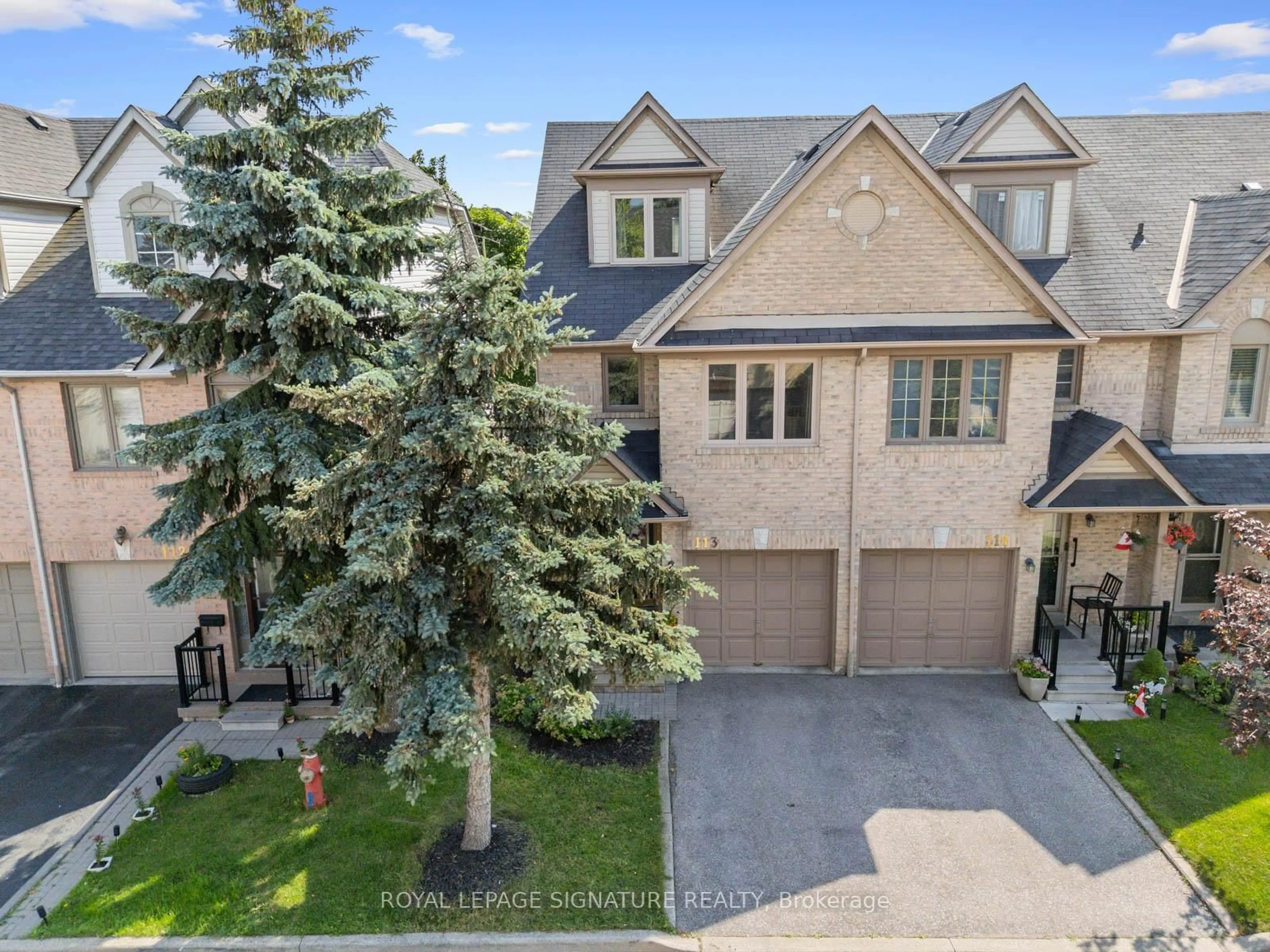 A pic from outside/outdoor area/front of a property/back of a property/a pic from drone, street for 1292 Sherwood Mills Blvd #113, Mississauga Ontario L5V 1S6