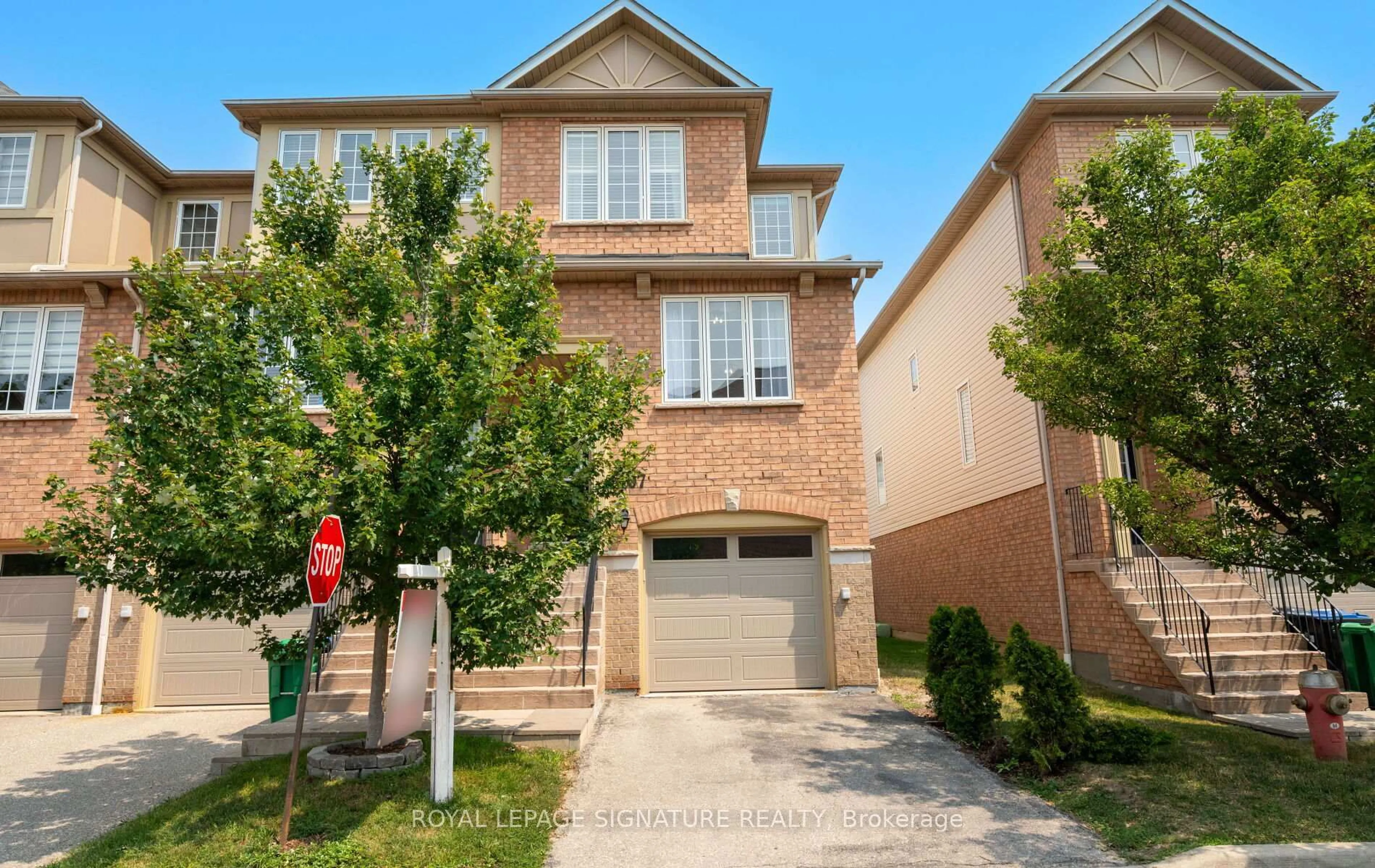 Home with brick exterior material, street for 5055 Heatherleigh Ave #107, Mississauga Ontario L5V 2R8