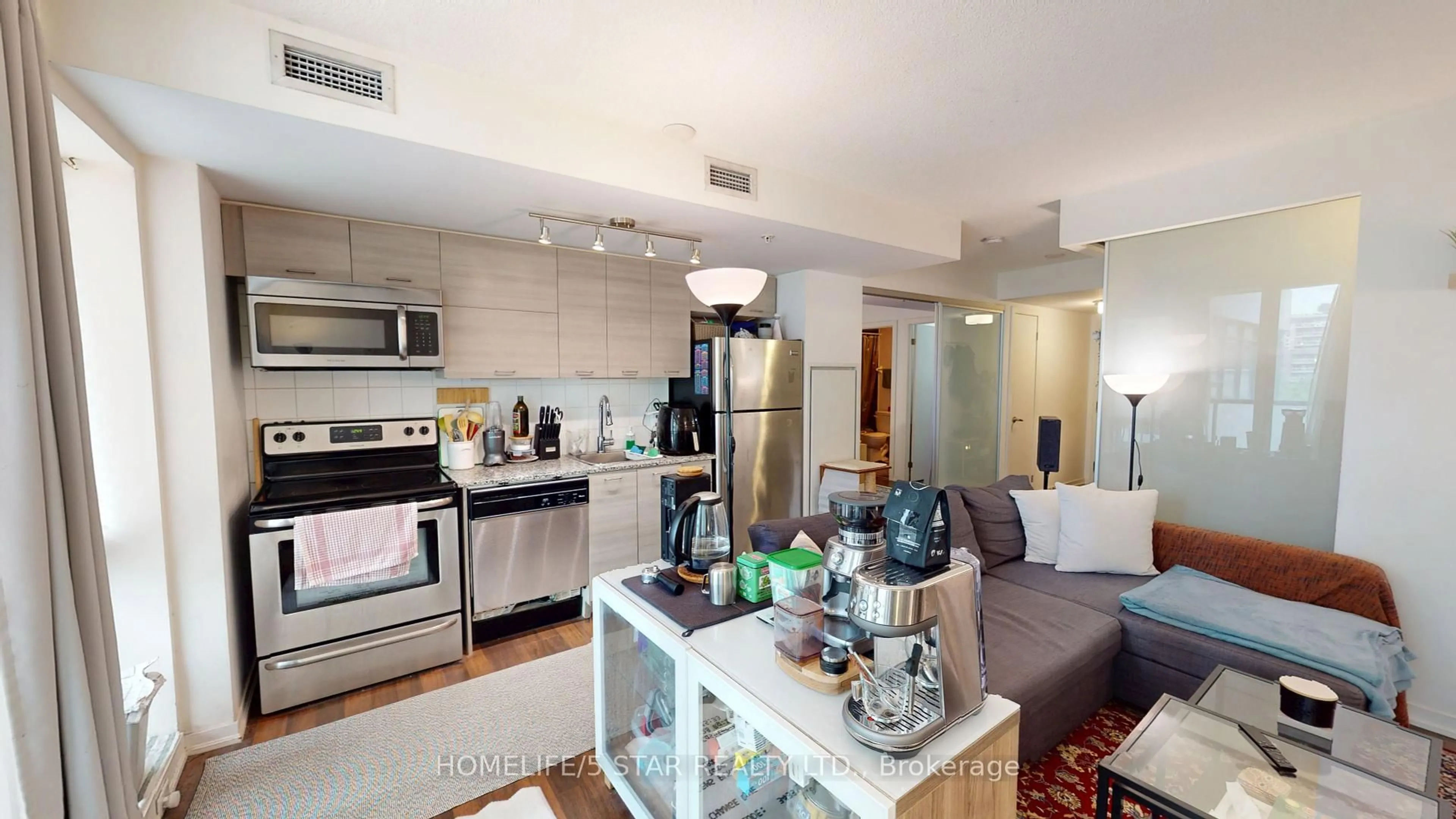Open concept kitchen, unknown for 20 JOE SHUSTER Way #521, Toronto Ontario M6K 0A3
