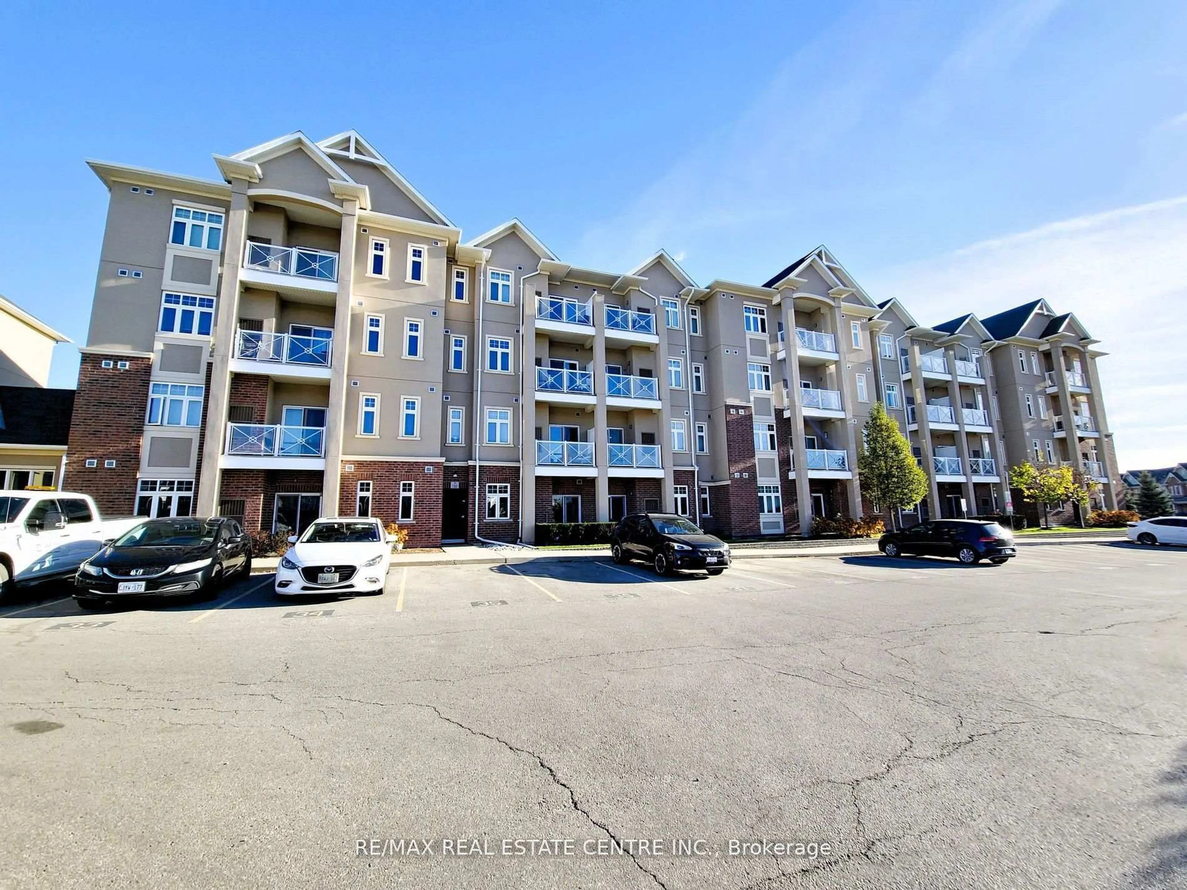 A pic from outside/outdoor area/front of a property/back of a property/a pic from drone, unknown for 1360 Costigan Rd #110, Milton Ontario L9T 8X6
