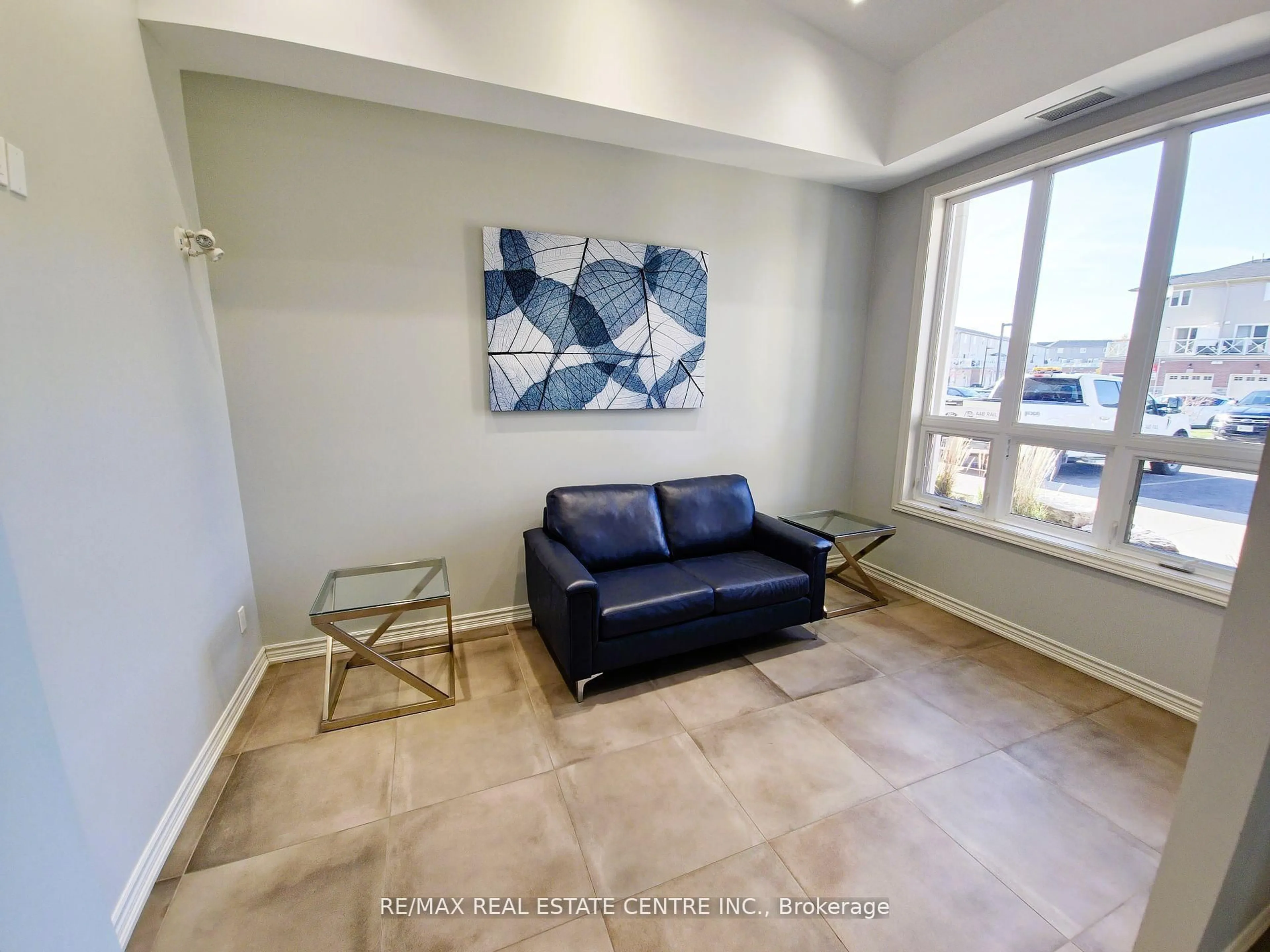 Living room with furniture, unknown for 1360 Costigan Rd #110, Milton Ontario L9T 8X6