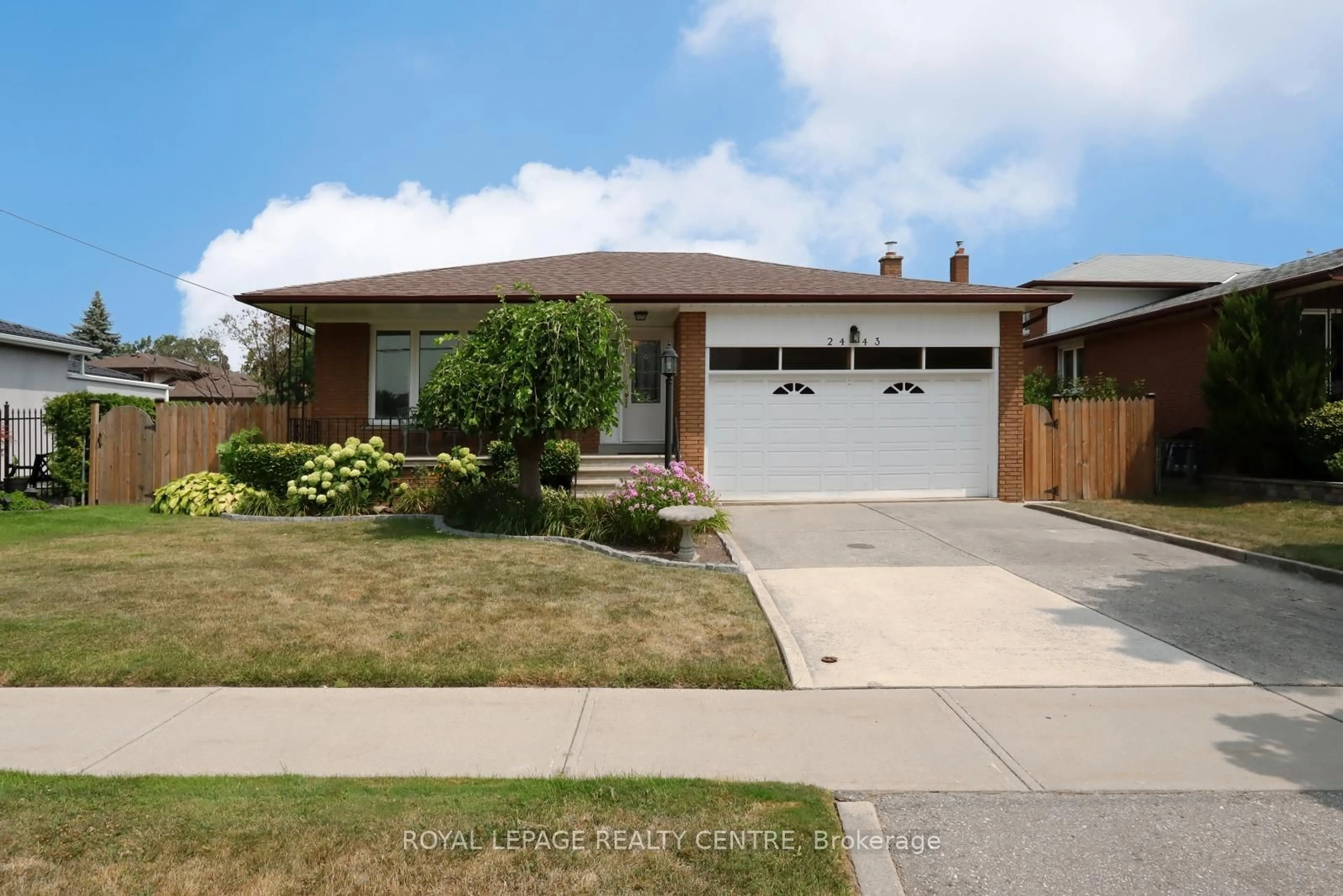Home with brick exterior material, street for 2443 Cliff Rd, Mississauga Ontario L5A 2P1