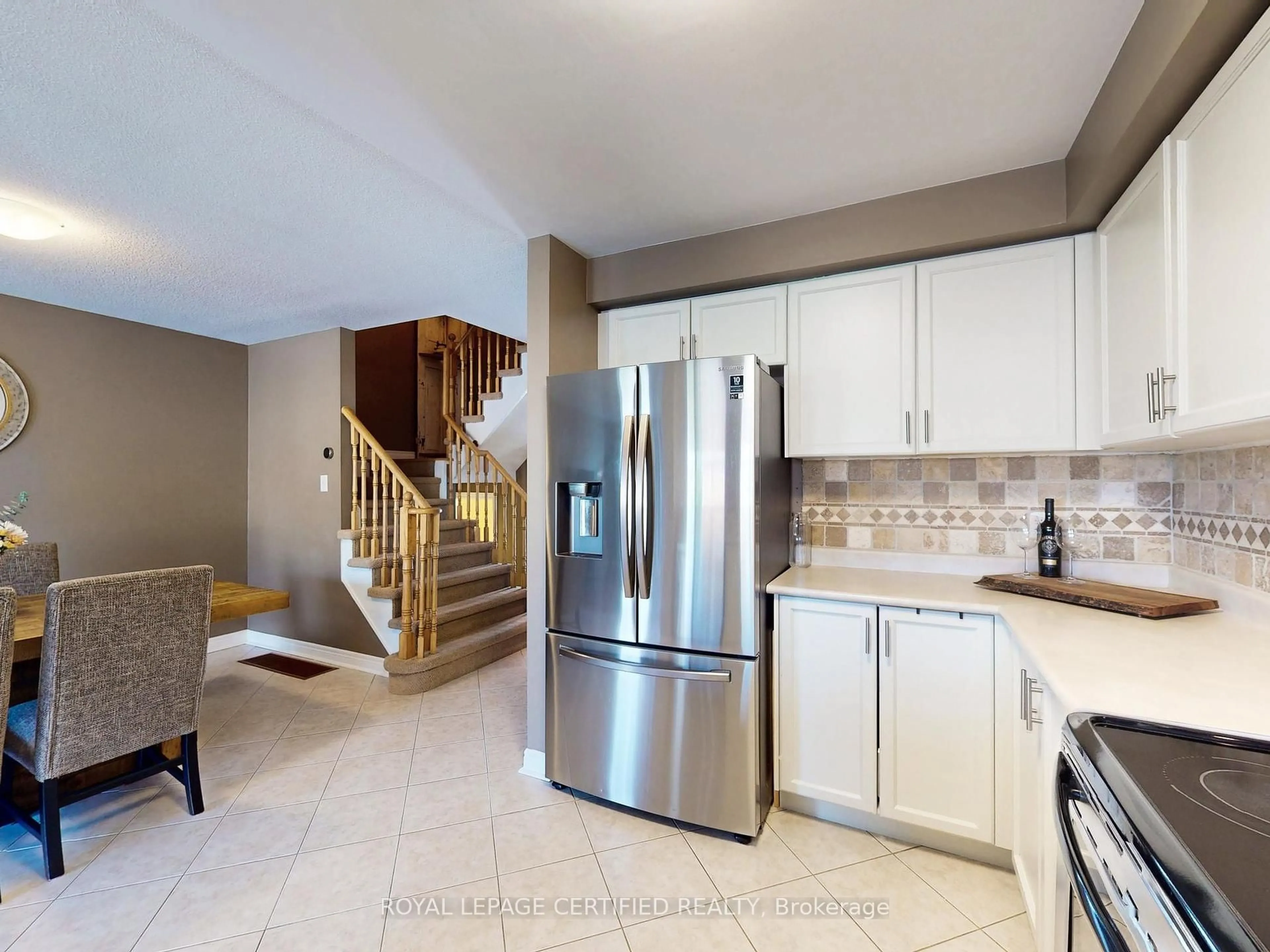 Open concept kitchen, ceramic/tile floor for 36 Aida Crt, Caledon Ontario L7E 2G8
