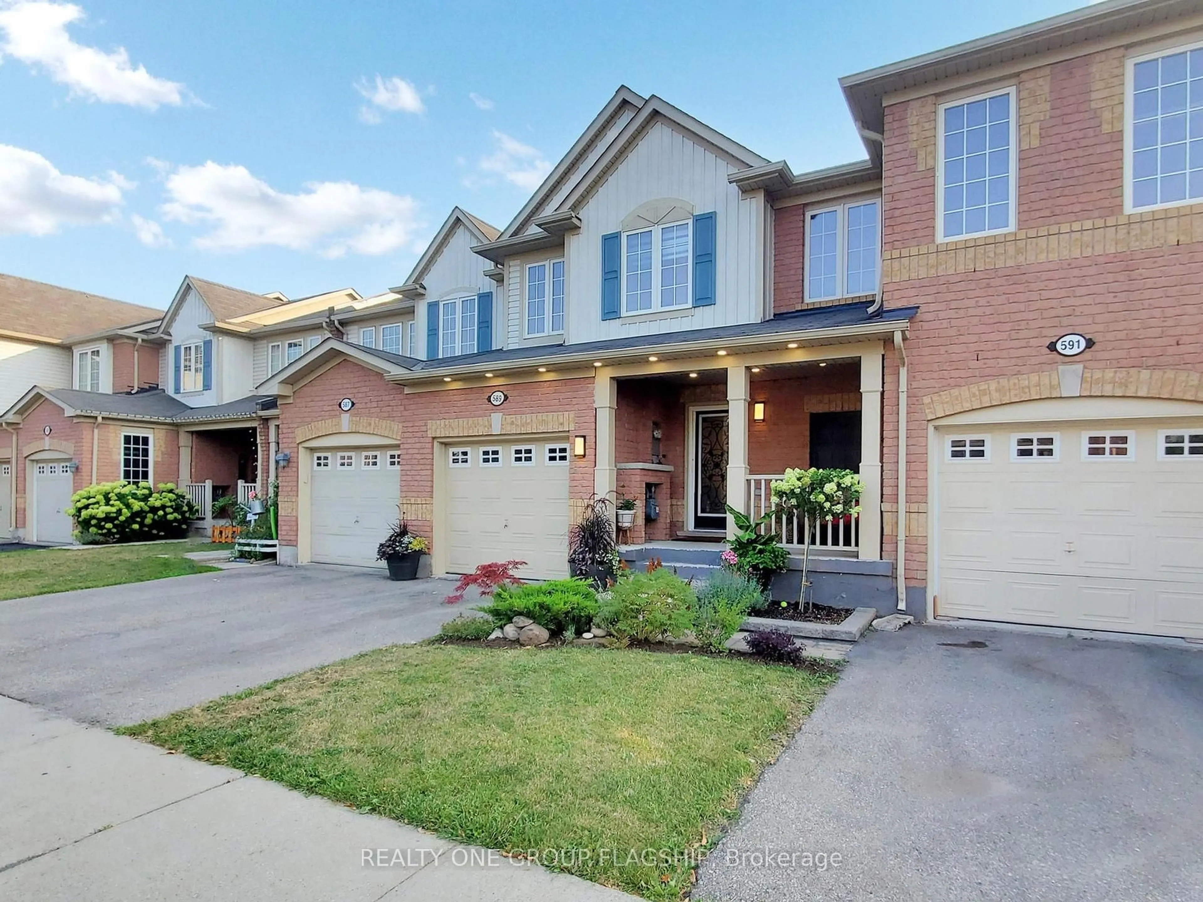 Home with brick exterior material, street for 589 Cargill Path, Milton Ontario L9T 7R6