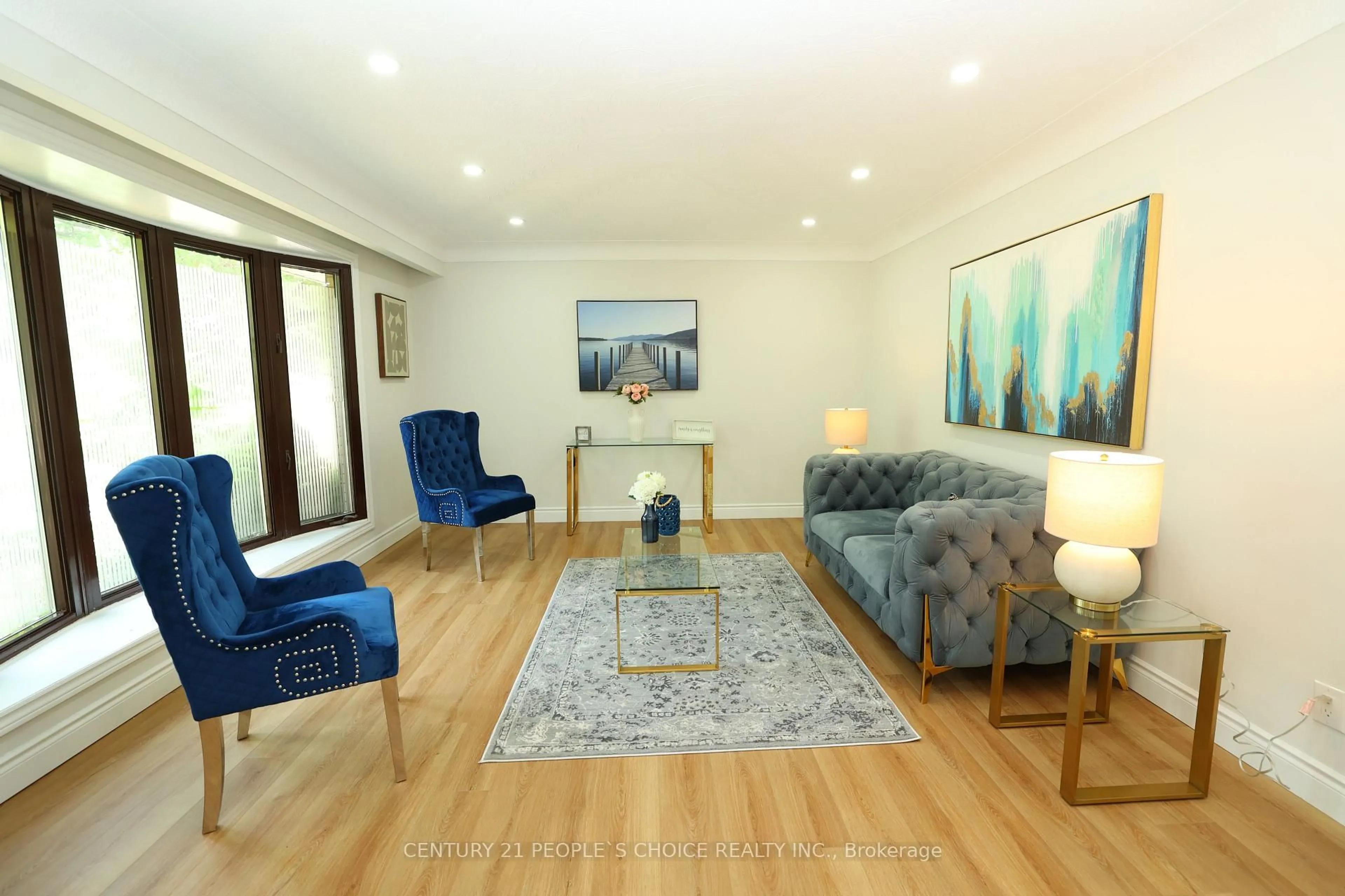 Living room with furniture, wood/laminate floor for 608 Thornwood Ave, Burlington Ontario L7N 3B8