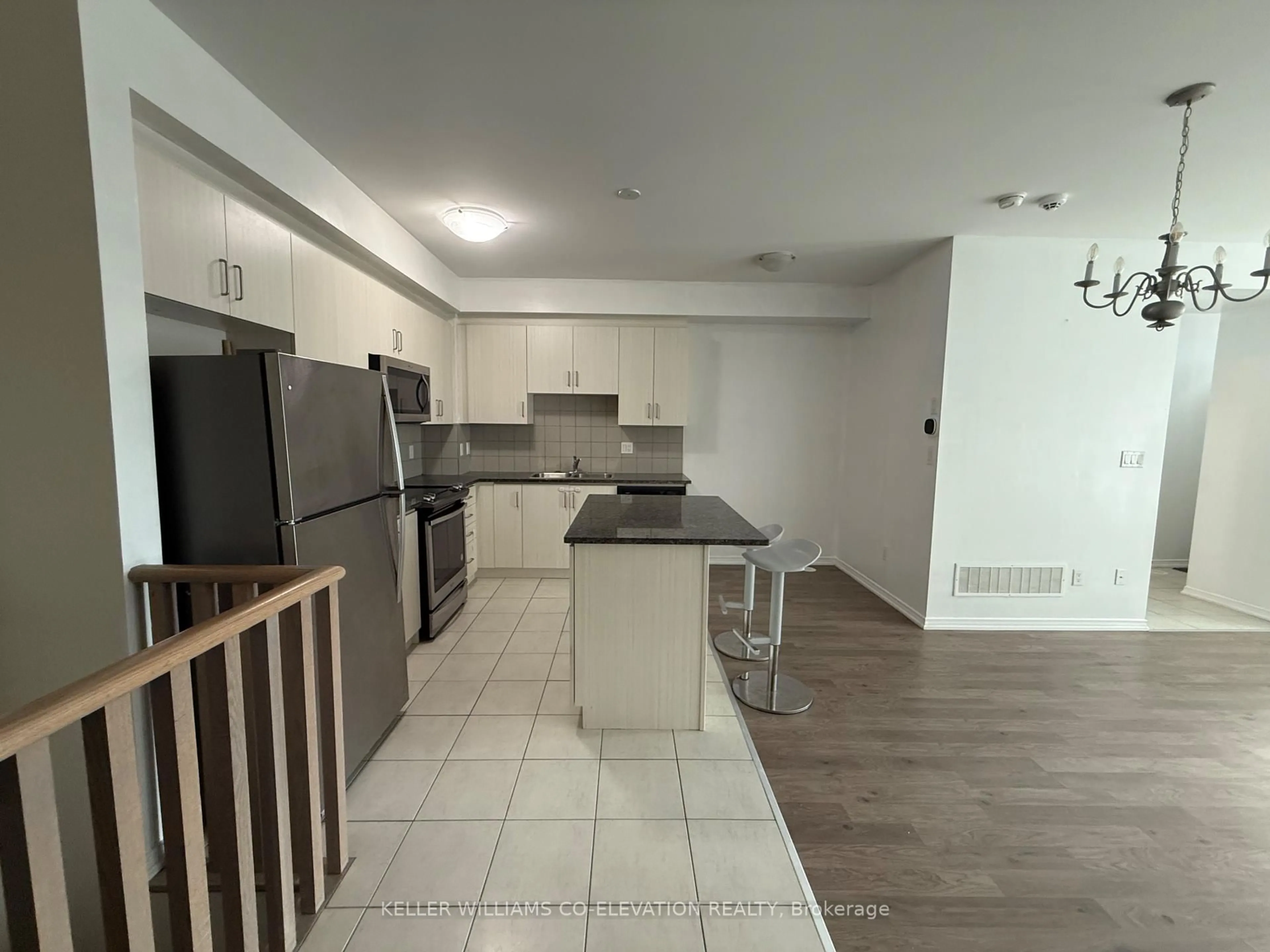 Open concept kitchen, unknown for 11 Applewood Lane #112, Toronto Ontario M9C 2Z7