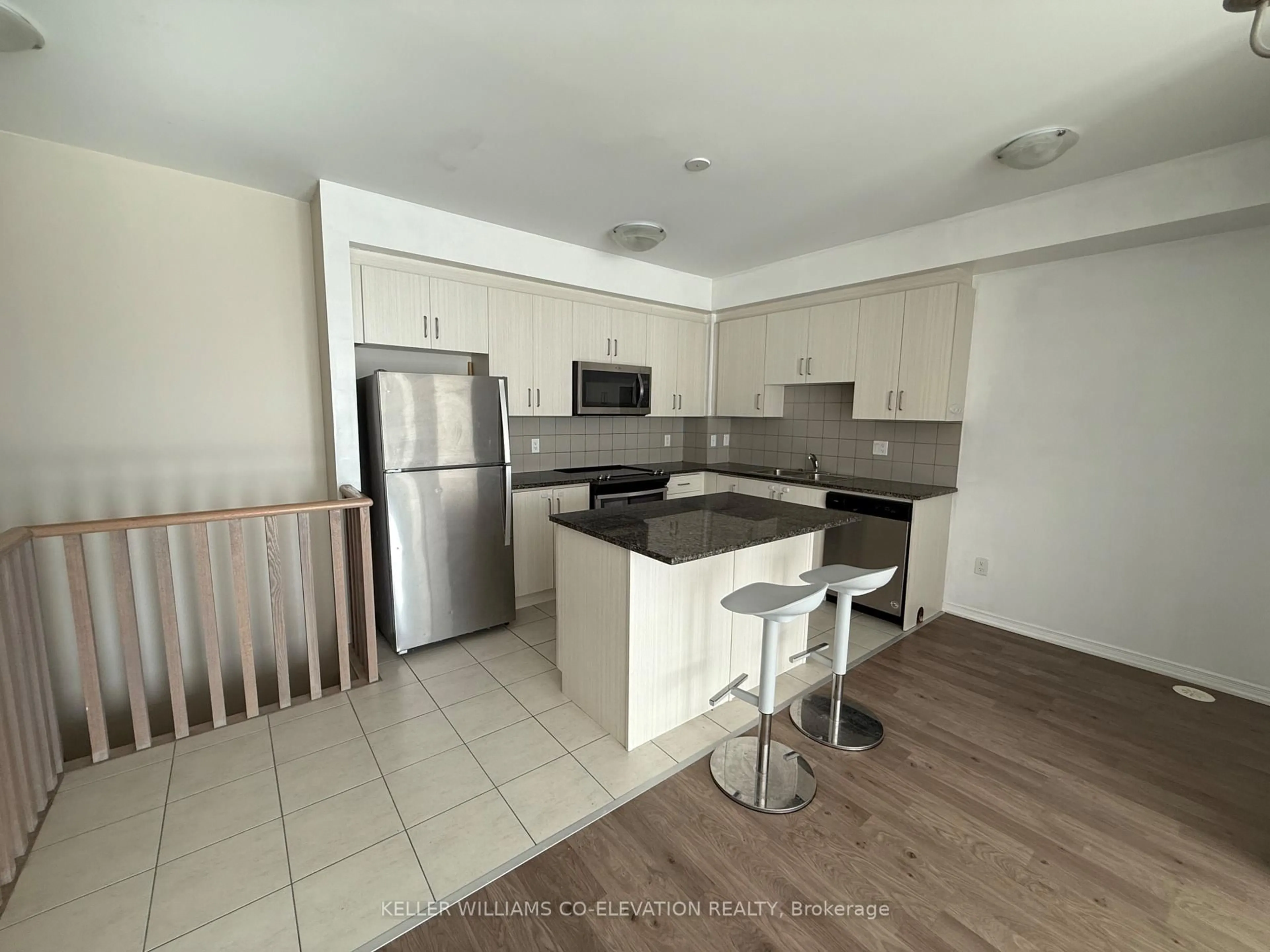 Open concept kitchen, unknown for 11 Applewood Lane #112, Toronto Ontario M9C 2Z7