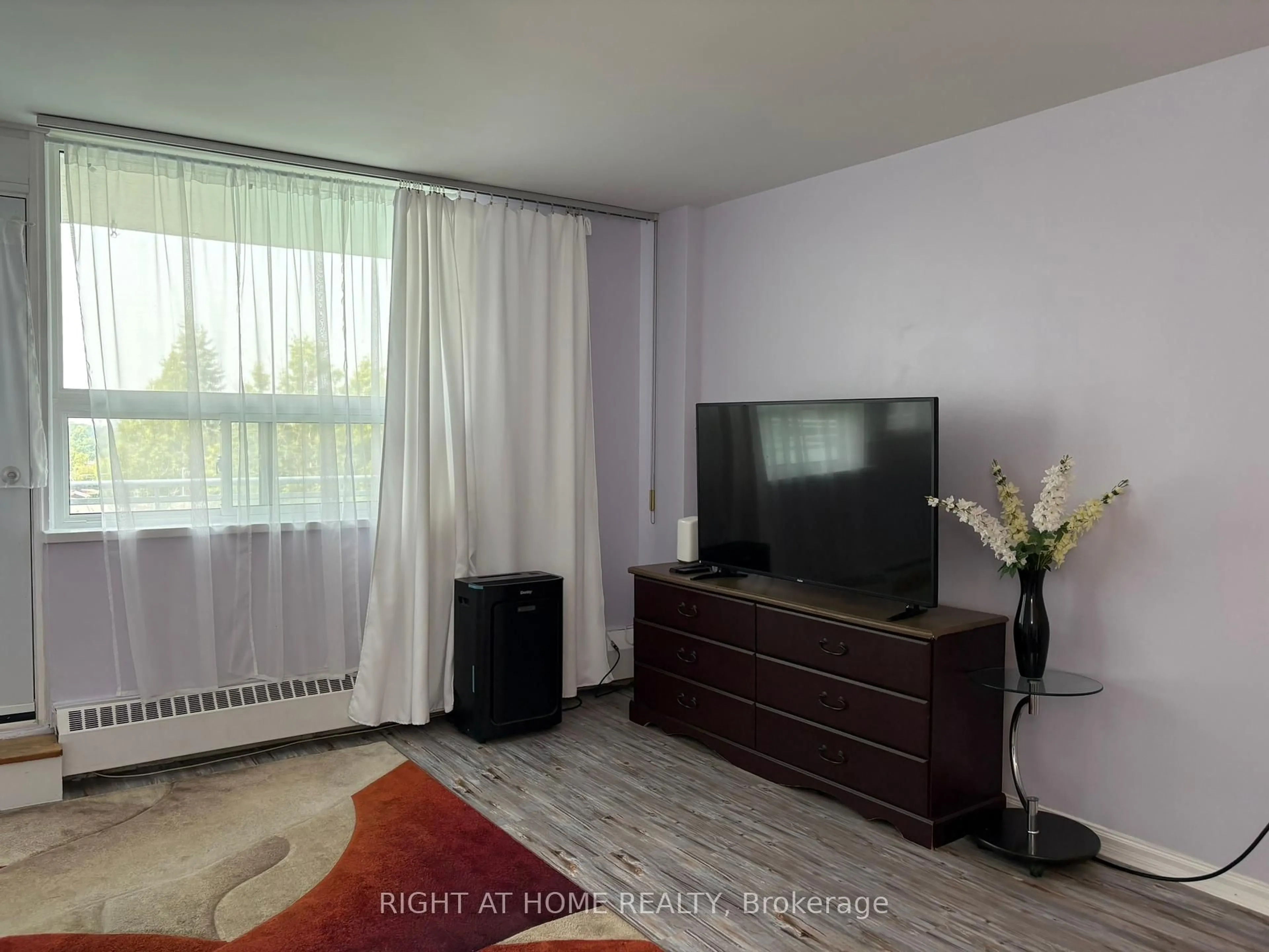 Living room with furniture, unknown for 3460 Keele St #201, Toronto Ontario M3J 1L9