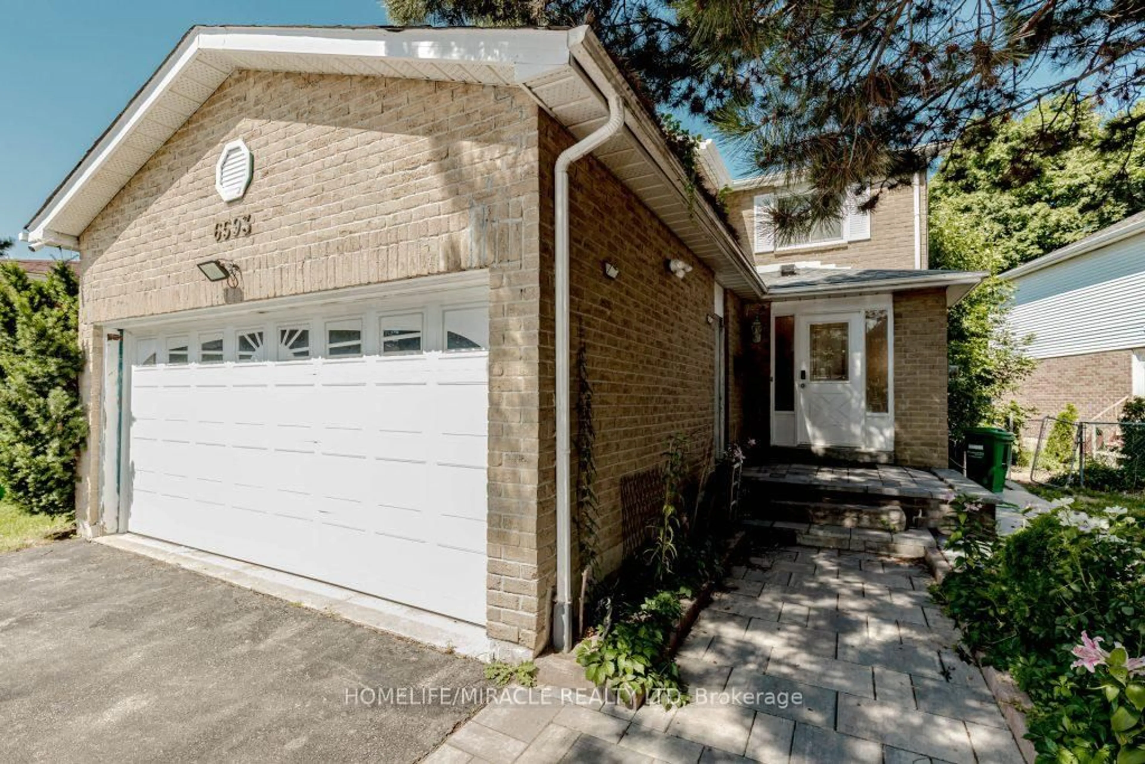 Home with brick exterior material, street for 6593 Edenwood Dr, Mississauga Ontario L5N 3E9