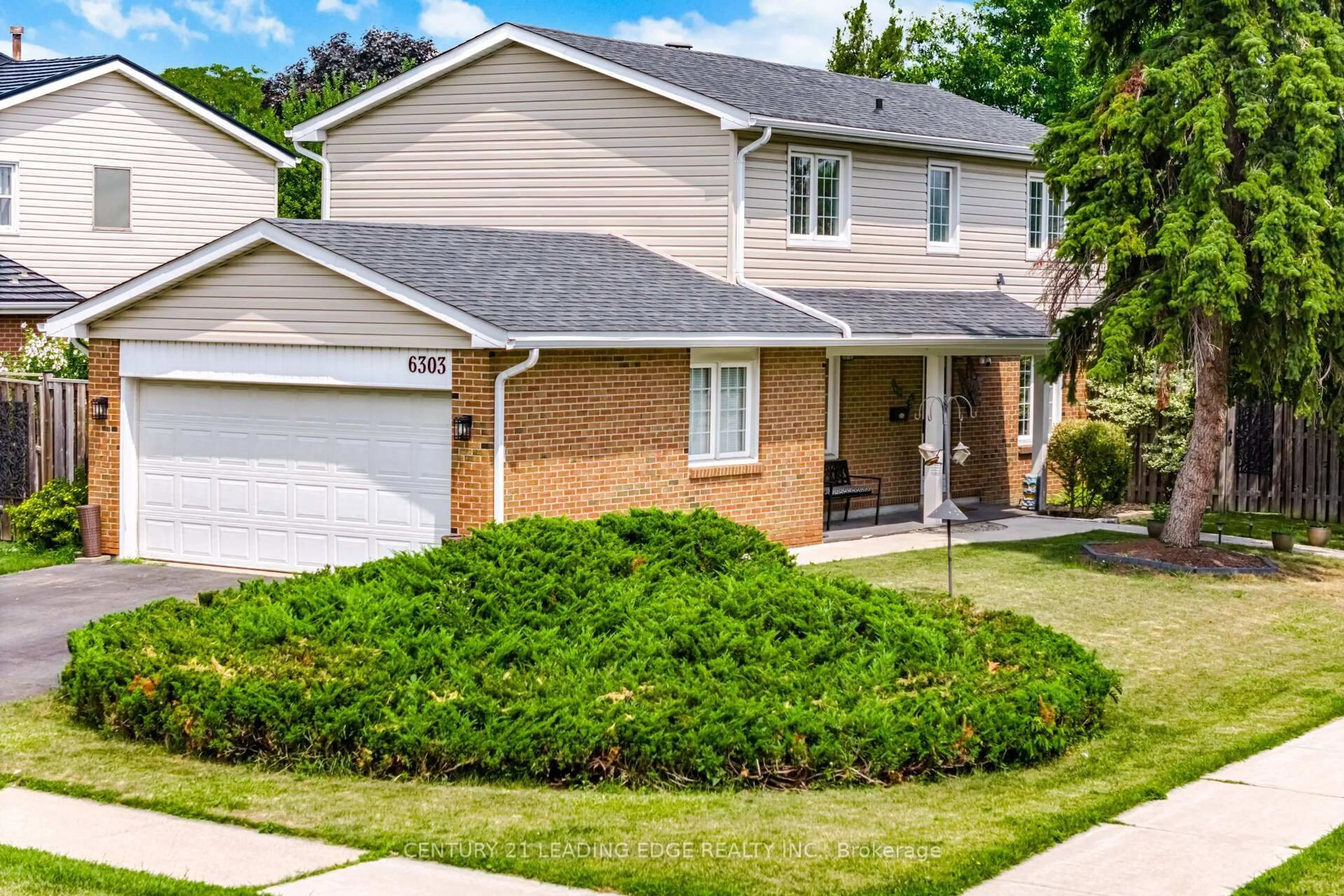 Home with brick exterior material, street for 6303 Neuchatel Rd, Mississauga Ontario L5N 2J7