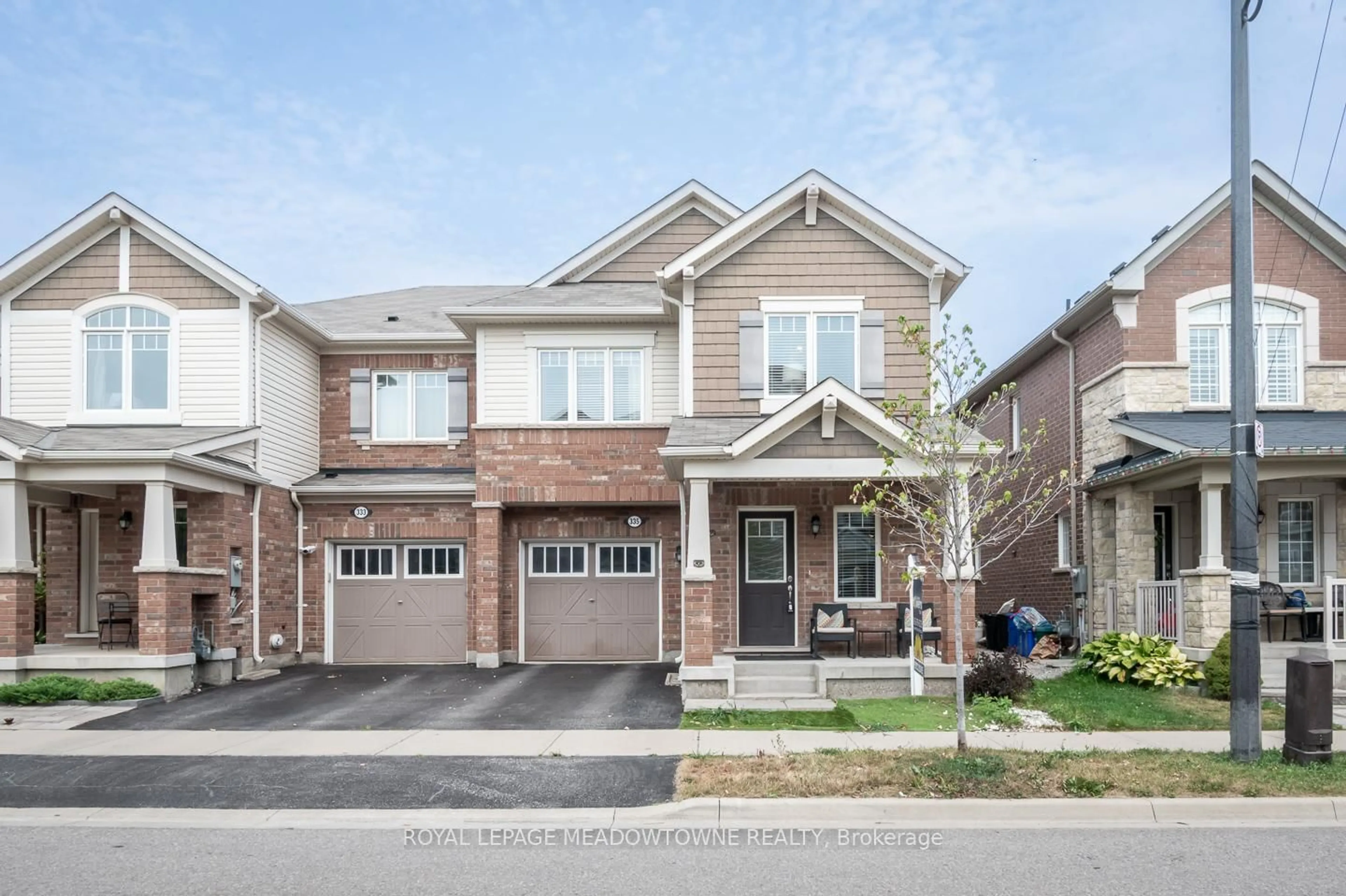 Home with brick exterior material, street for 335 Gooding Cres, Milton Ontario L9E 0A5