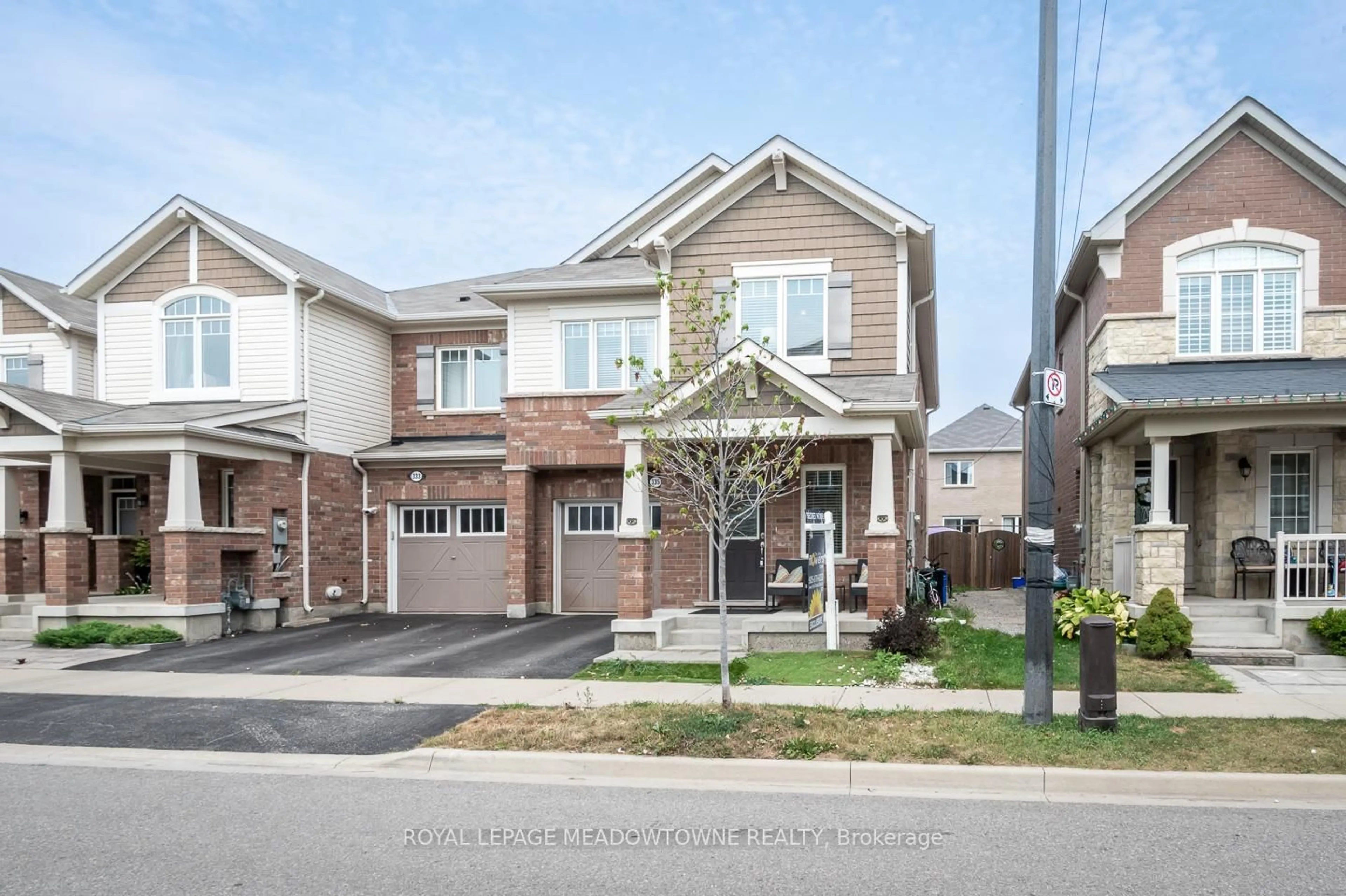 Home with brick exterior material, street for 335 Gooding Cres, Milton Ontario L9E 0A5