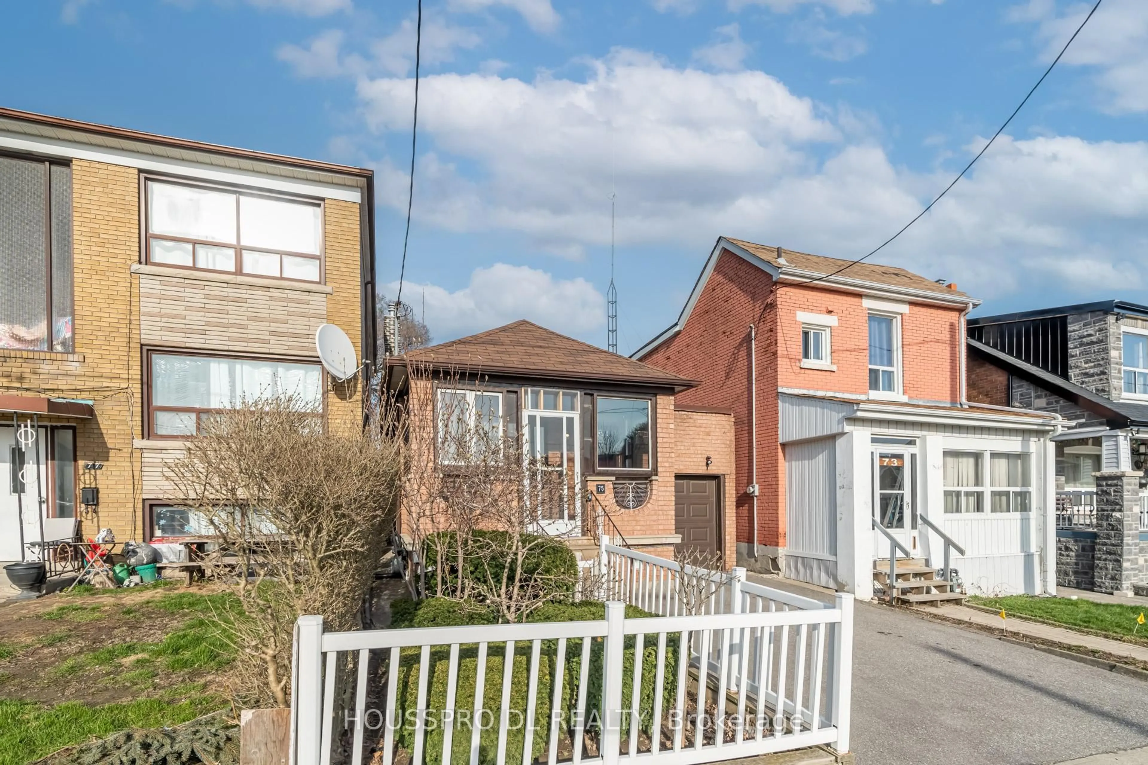 A pic from outside/outdoor area/front of a property/back of a property/a pic from drone, street for 75 Ennerdale Rd, Toronto Ontario M6E 4C5