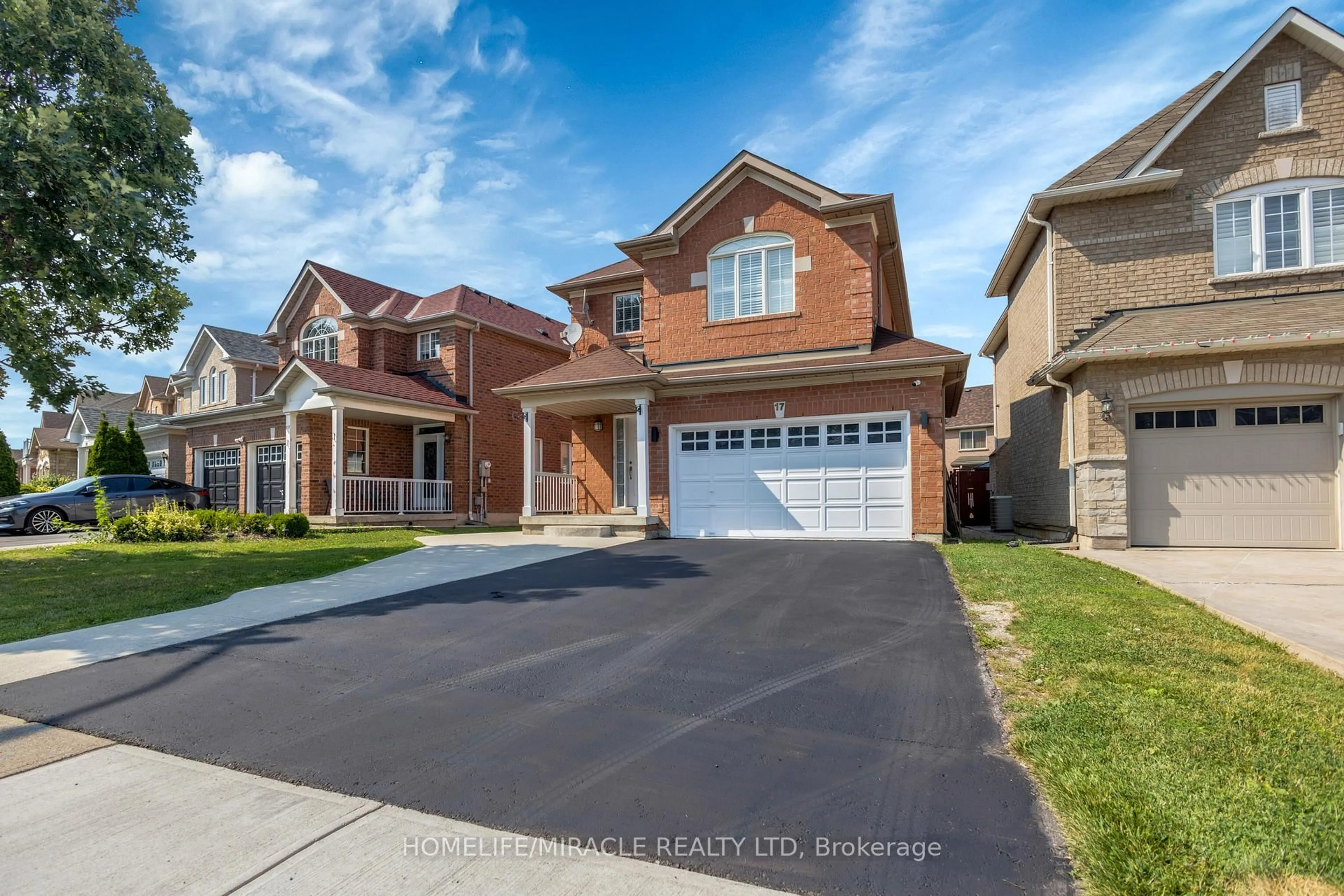 Home with brick exterior material, street for 17 Binder Twine Tr, Brampton Ontario L6X 4R2