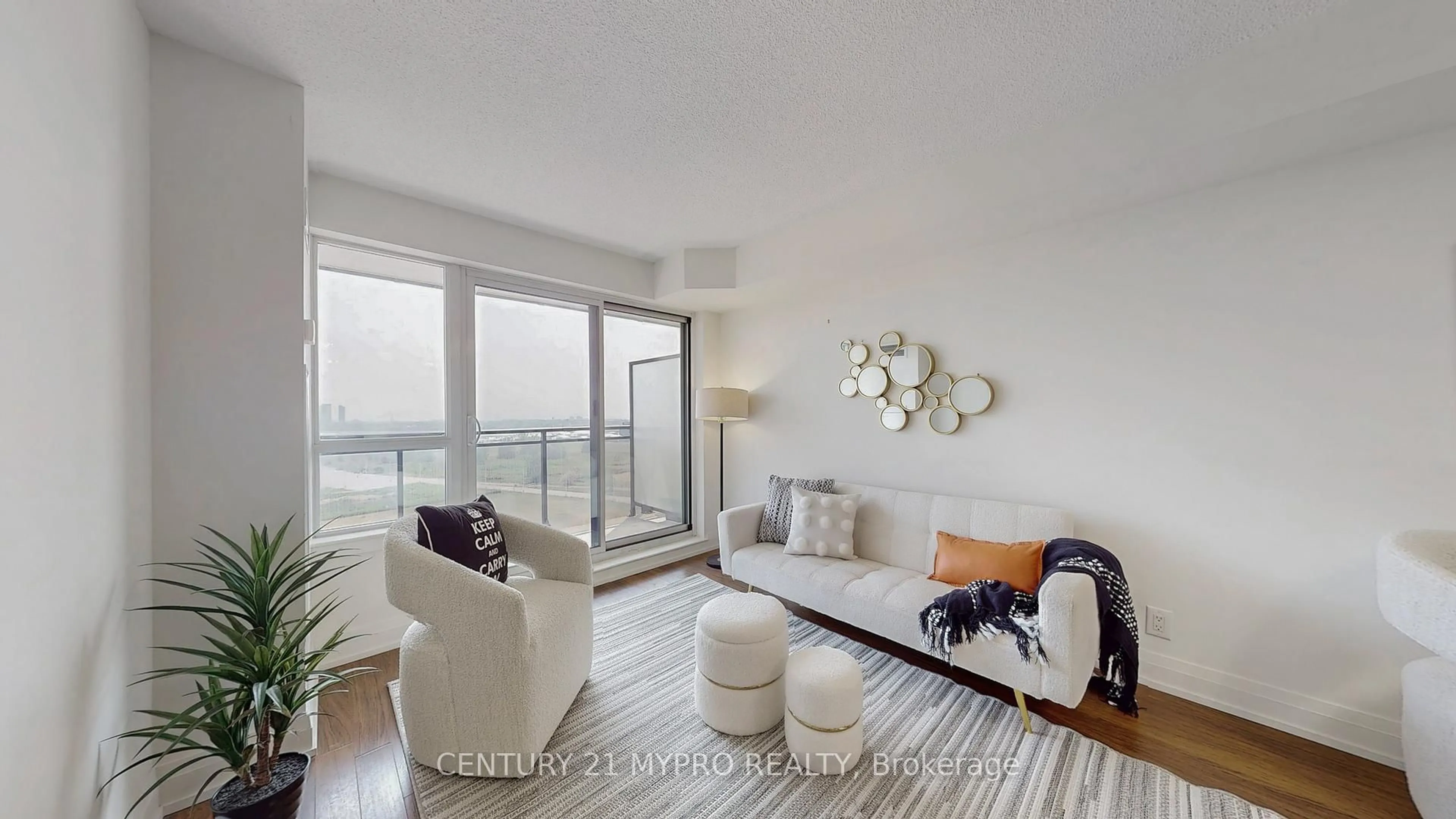 Living room with furniture, wood/laminate floor for 1060 Sheppard Ave #1214, Toronto Ontario M3J 0G7