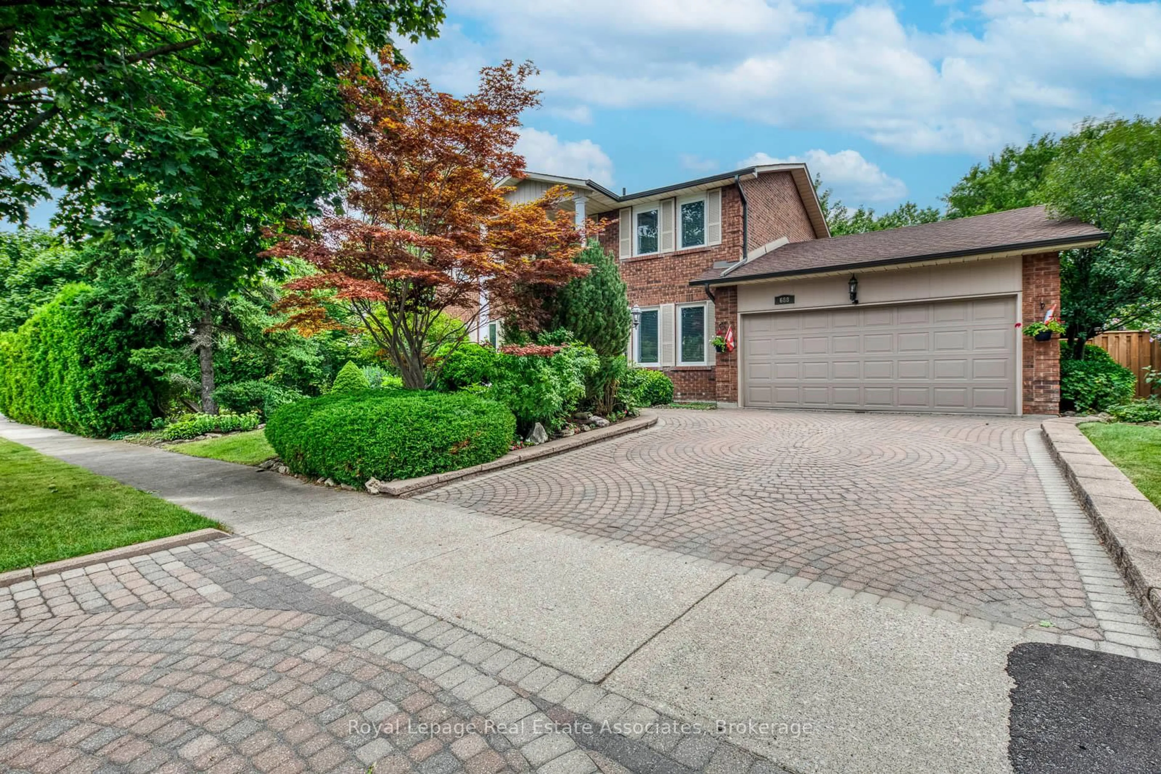 Home with brick exterior material, street for 688 Fieldstone Rd, Mississauga Ontario L5C 3M5