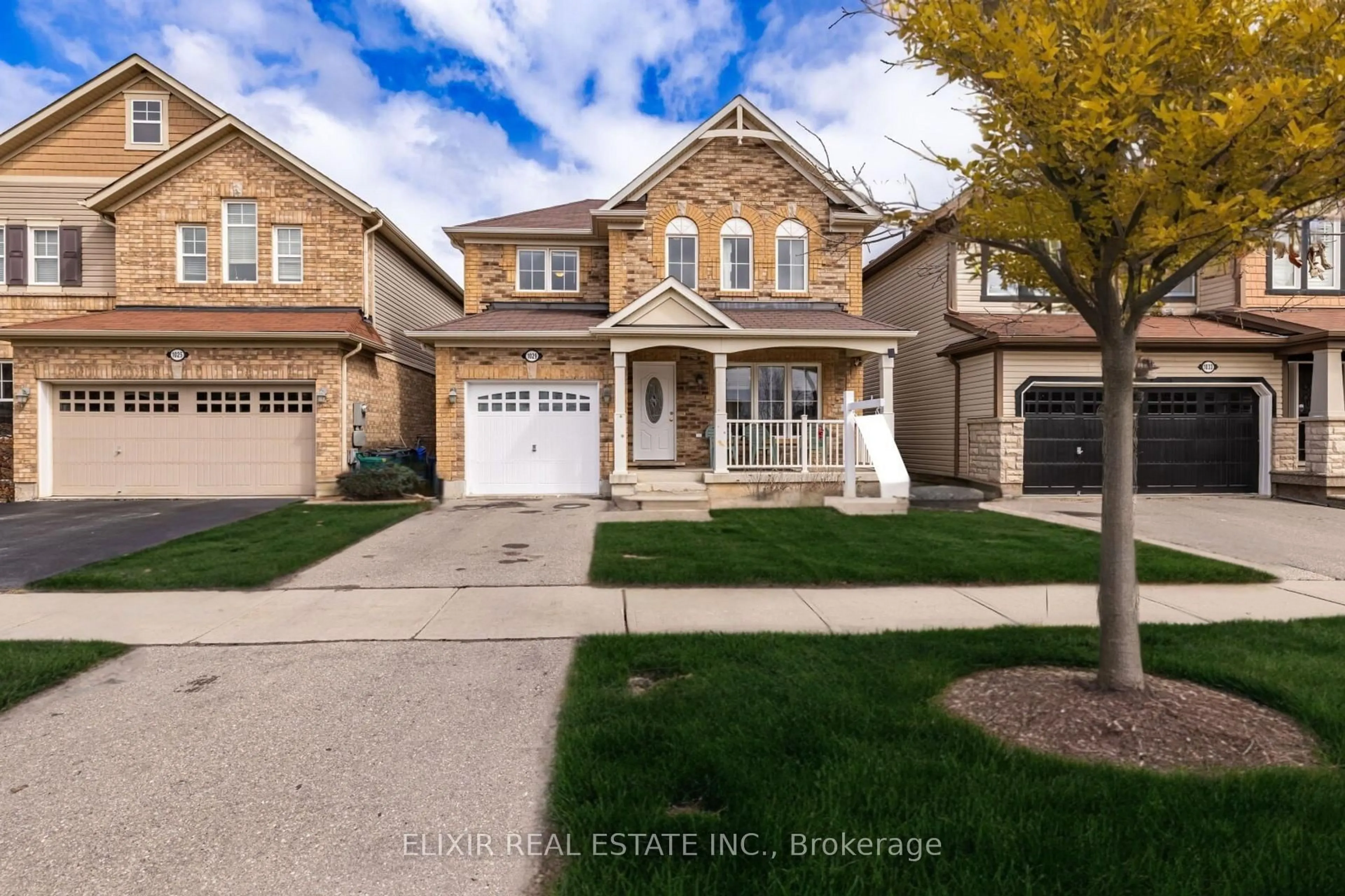 Home with brick exterior material, street for 1029 Farmstead. Dr, Milton Ontario L9T 8G4