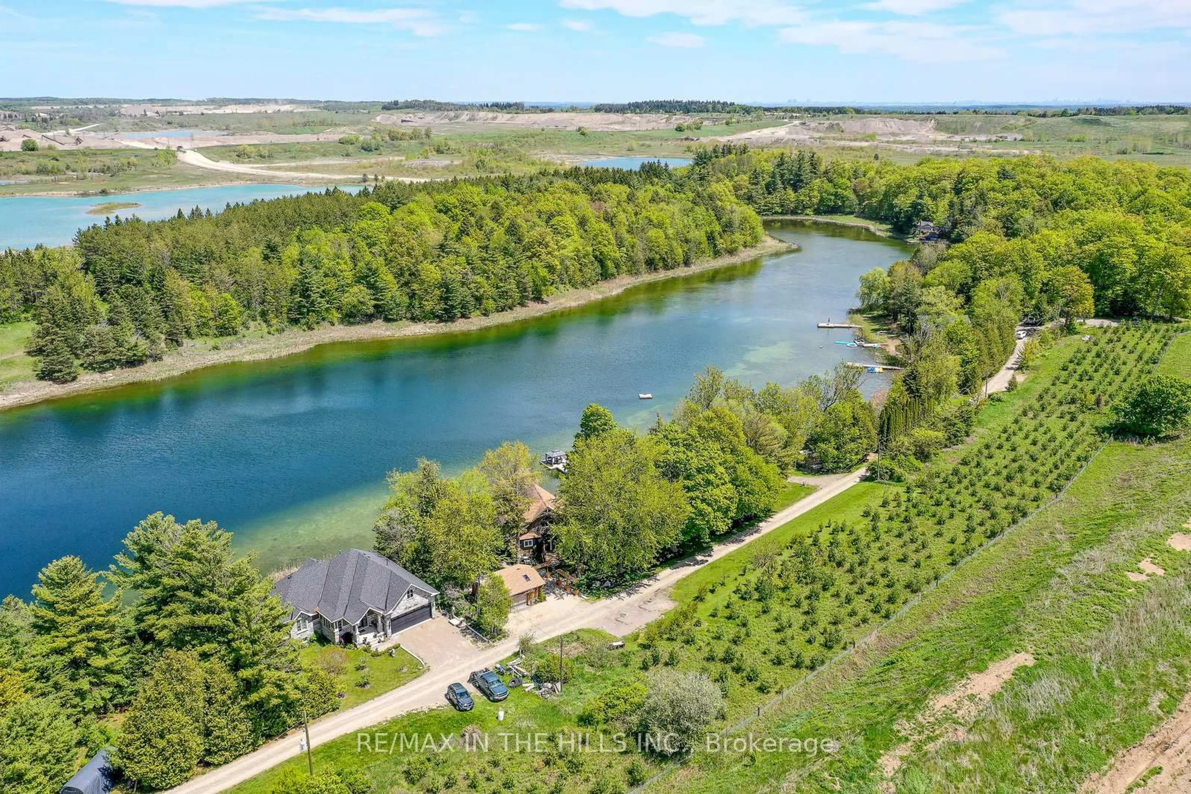 A pic from outside/outdoor area/front of a property/back of a property/a pic from drone, water/lake/river/ocean view for 143 Green Lake Rd #143, Caledon Ontario L7K 0S4