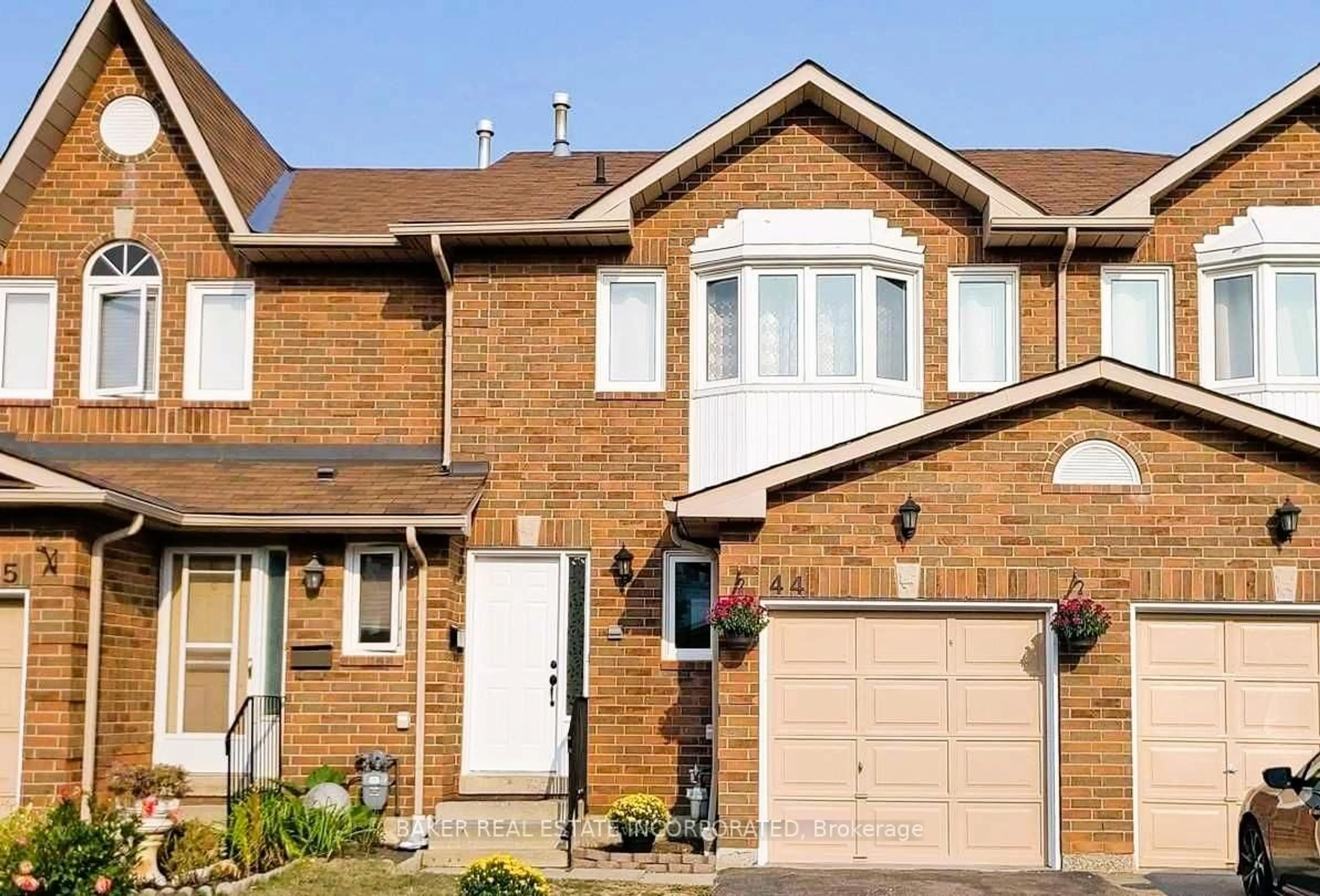 Home with brick exterior material, street for 1485 Torrington Dr #44, Mississauga Ontario L5V 1Y3