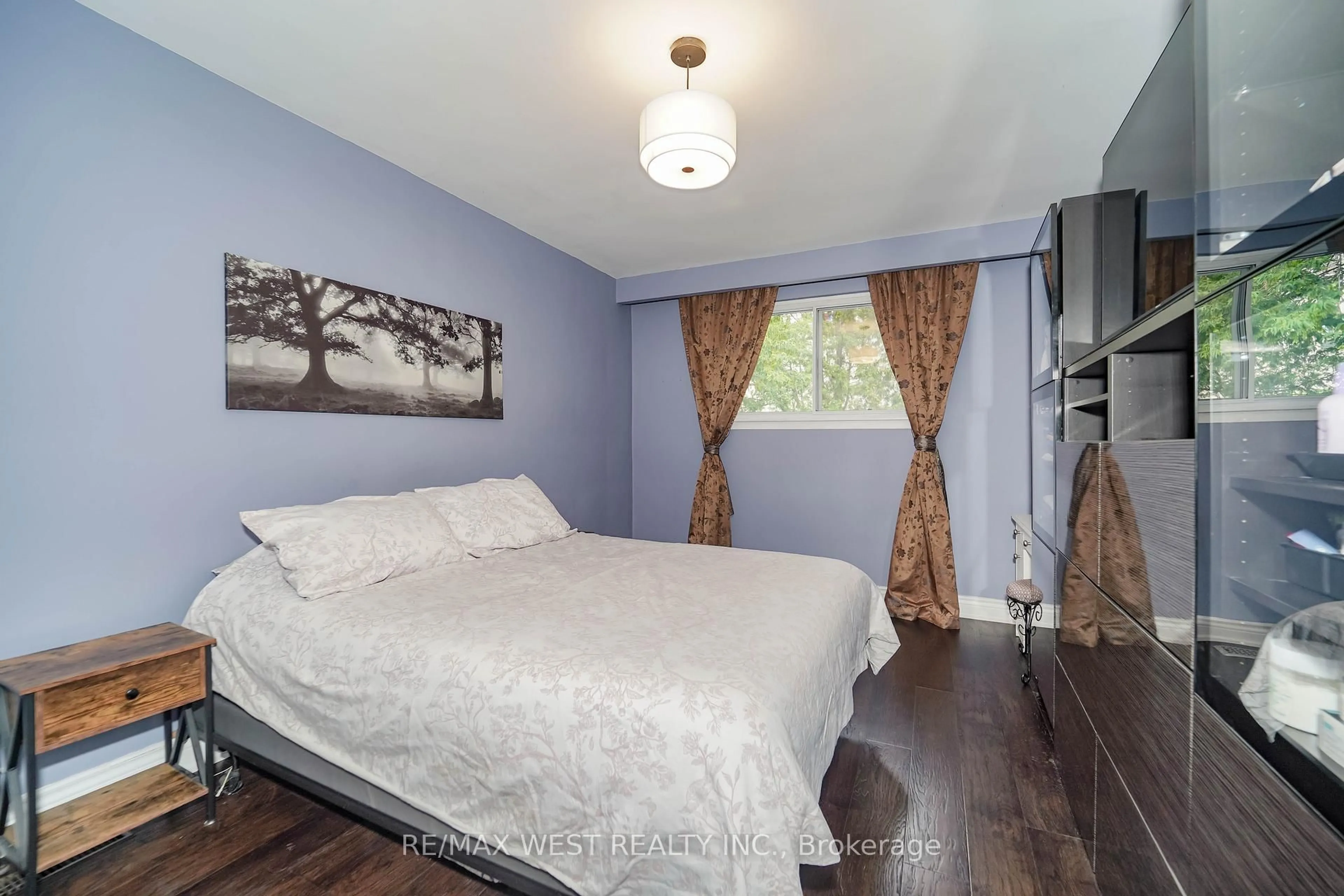 Bedroom with bed, wood/laminate floor for 110 Wareside Rd, Toronto Ontario M9C 3B6