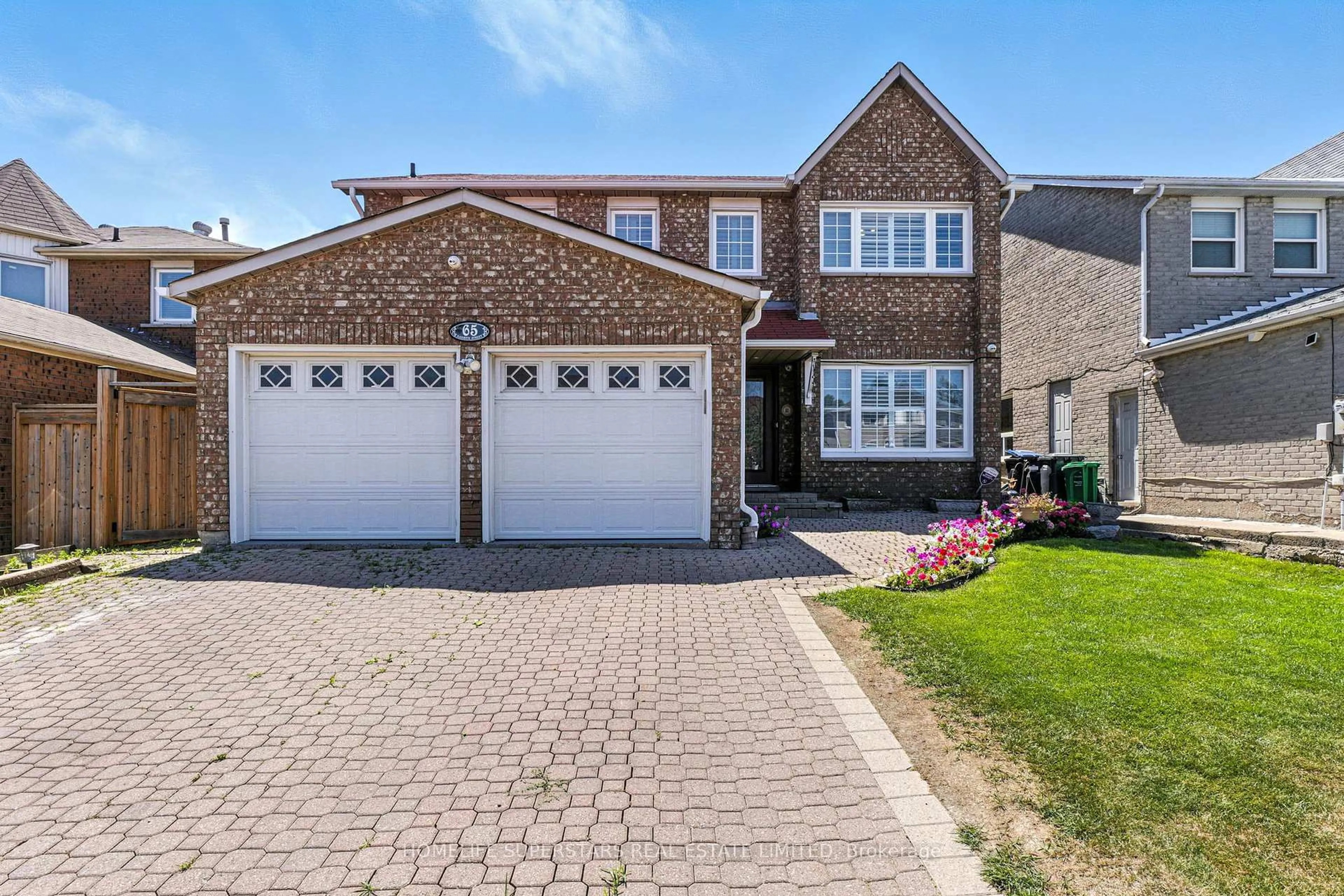 Home with brick exterior material, street for 65 Nasmith St, Brampton Ontario L6S 4Z6