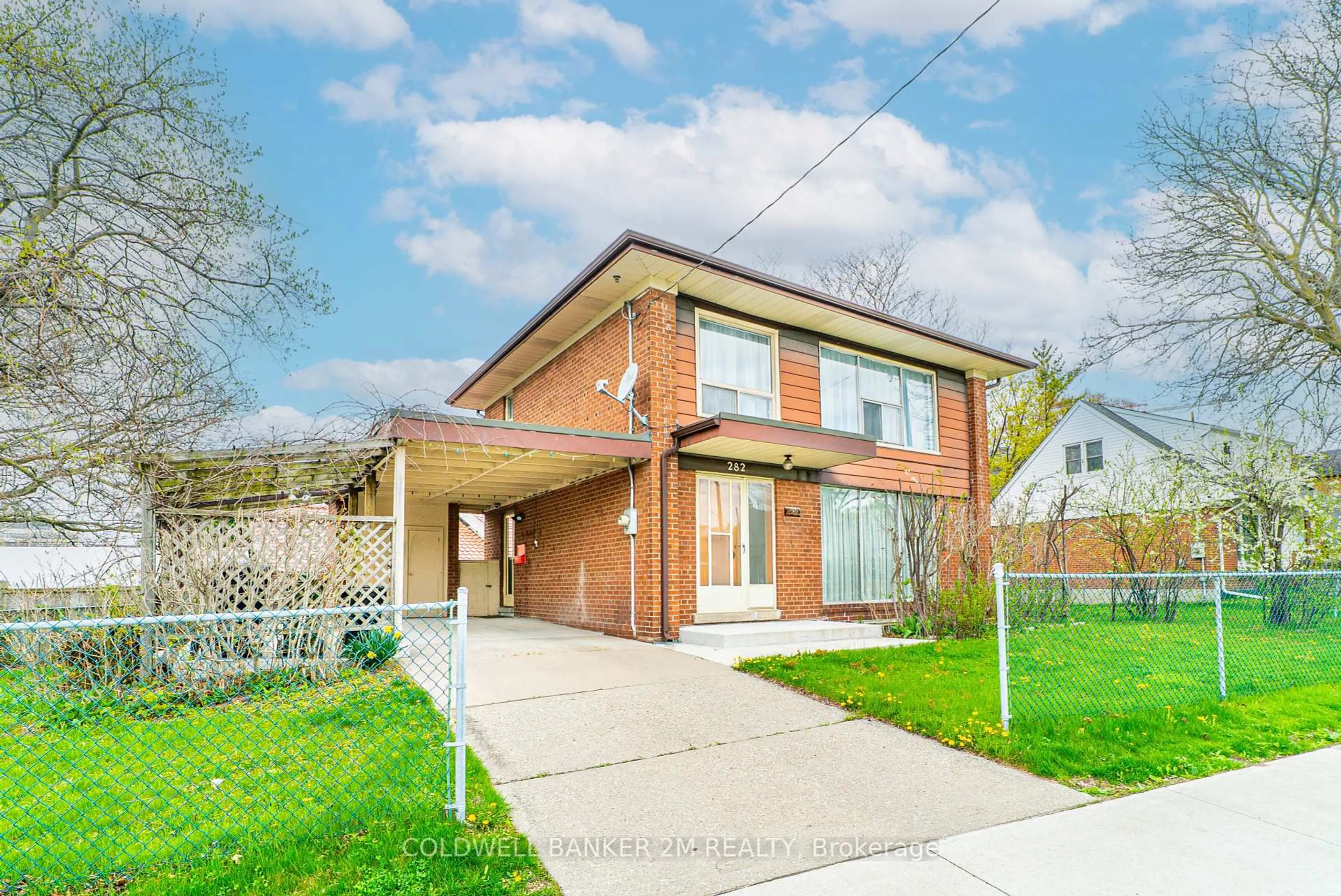 Home with brick exterior material, street for 282 The East Mall, Toronto Ontario M9B 3Z3