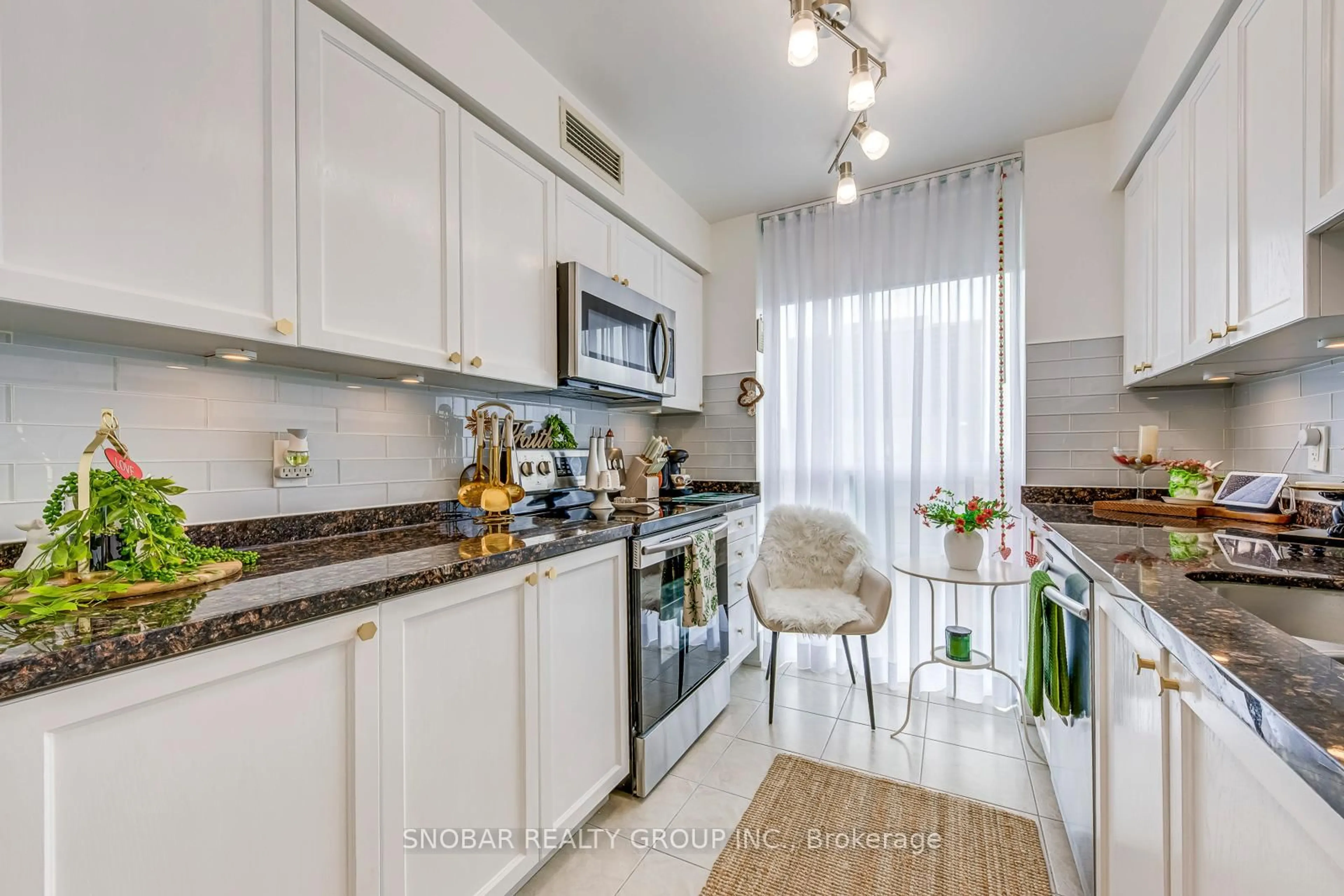 Open concept kitchen, unknown for 7 Michael Power Pl #1503, Toronto Ontario M9A 0A4