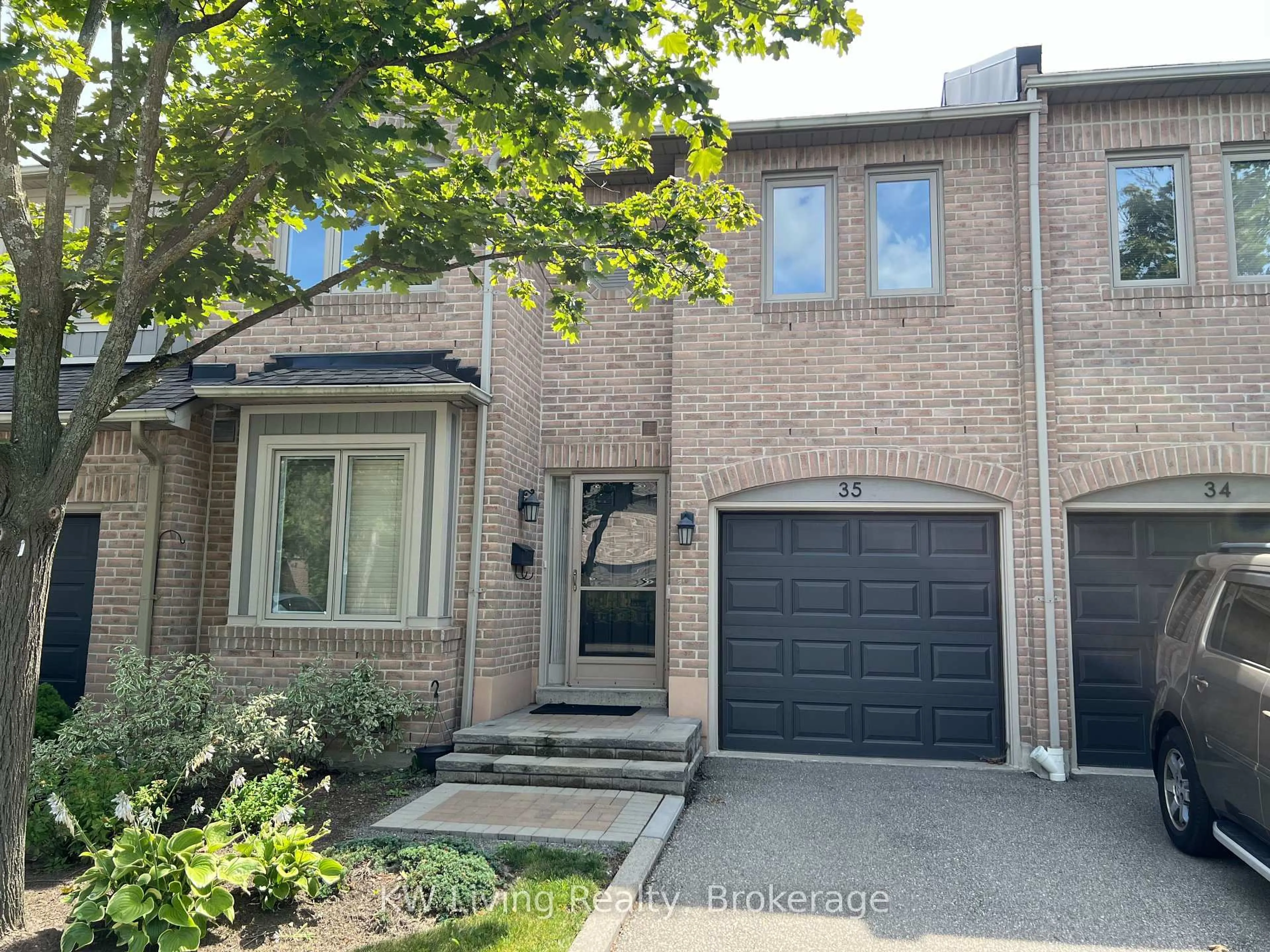 Home with brick exterior material, street for 5490 Glen Erin Dr #35, Mississauga Ontario L5M 5R4