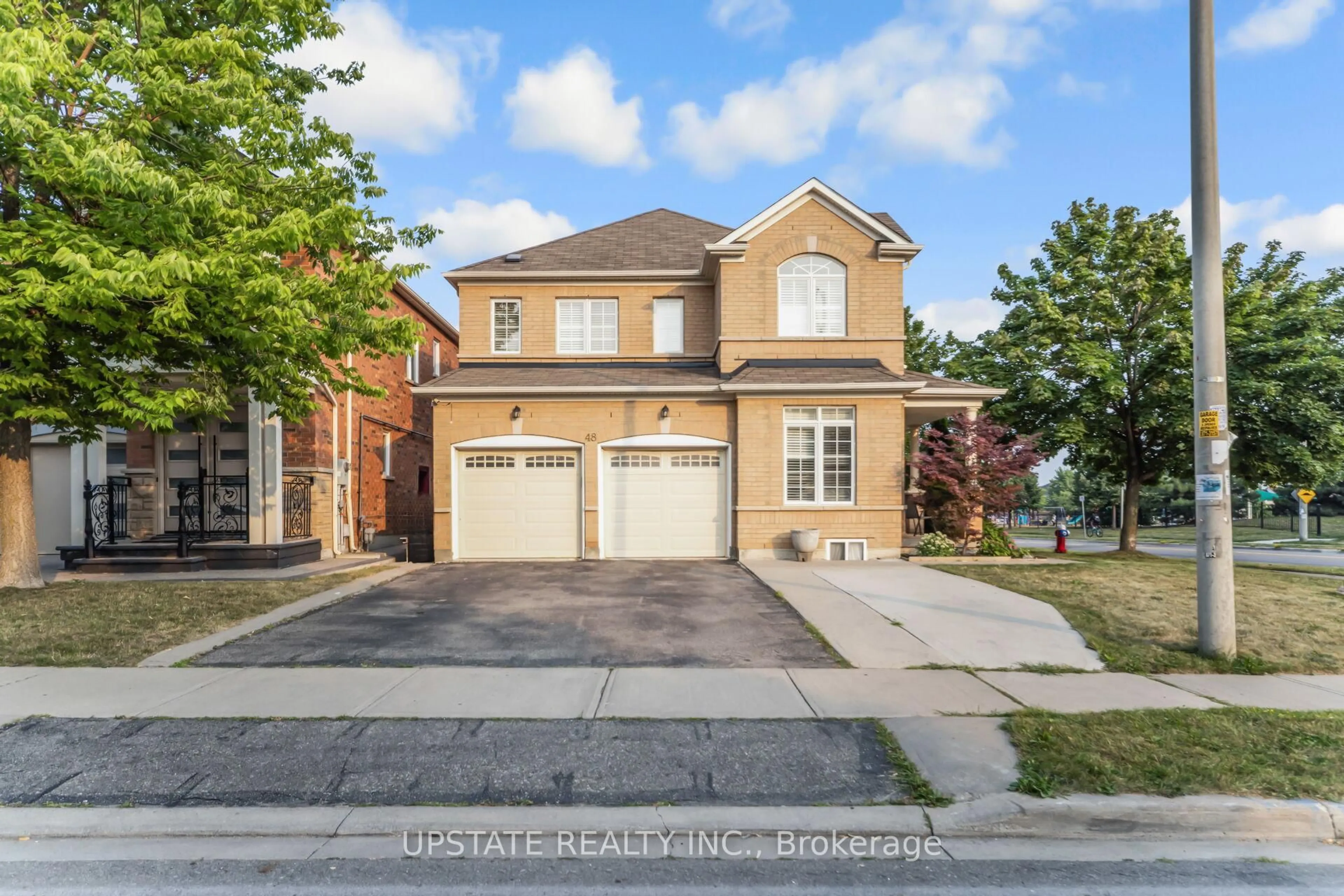 Home with brick exterior material, street for 48 Clementine Dr, Brampton Ontario L6Y 5R7